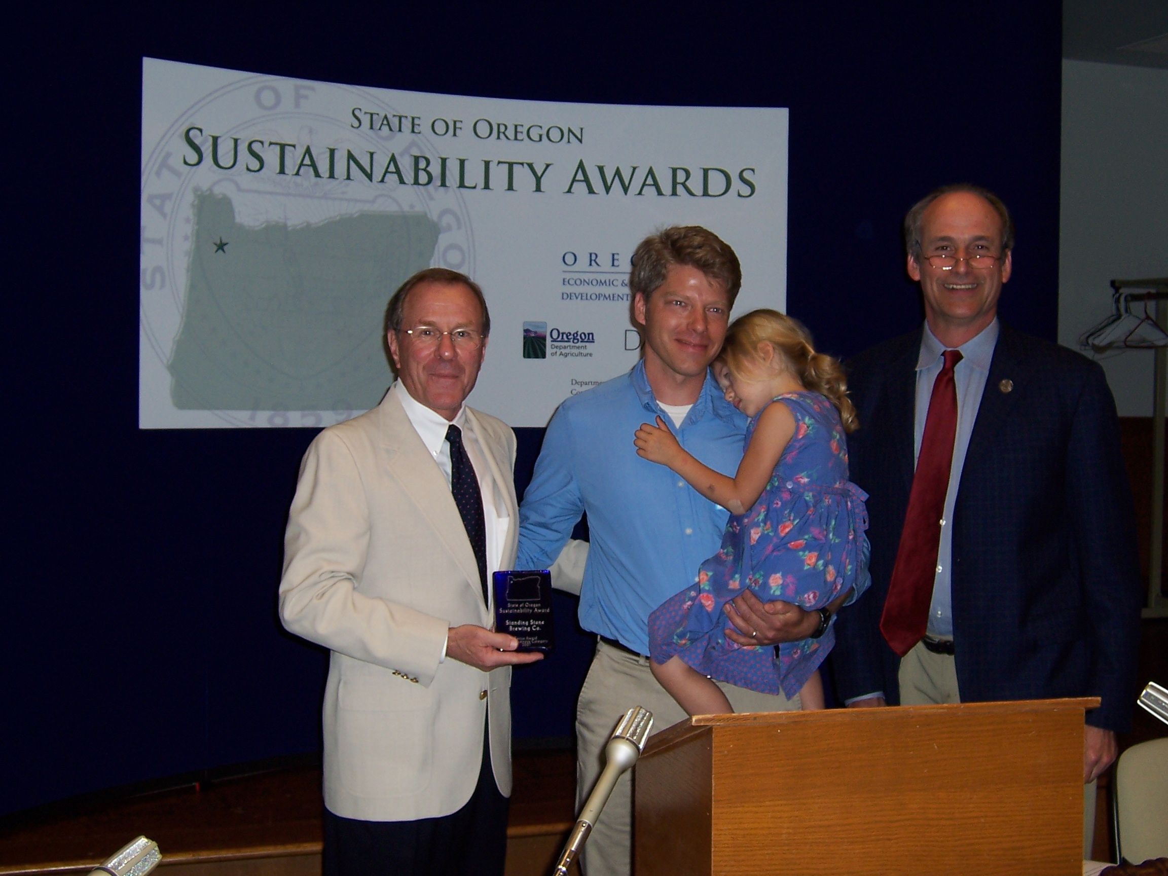 Gov. Kulongowski presents sustainability award to Amarotico and Standing Stone Brewery