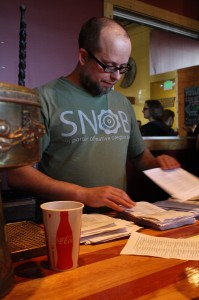 Oregon Brewers Guild's Brian Butenschoen tallies up the votes