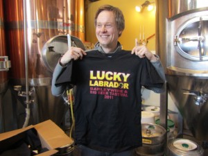 Lucky Lab's Gary Geist displays new 2011 Barleywine and Big Beer t-shirts
