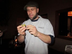 Burnside Brewmaster Jason McAdam inspects a Jamaican Scotch Bonnet Pepper