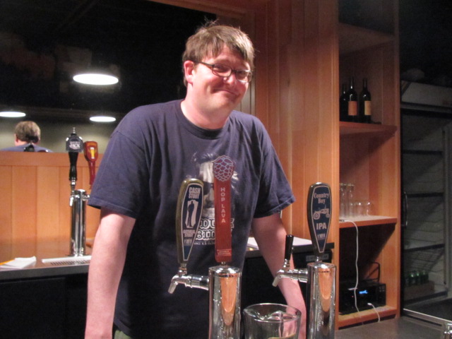 By The Bottle beertender Wade Fauth in the taproom