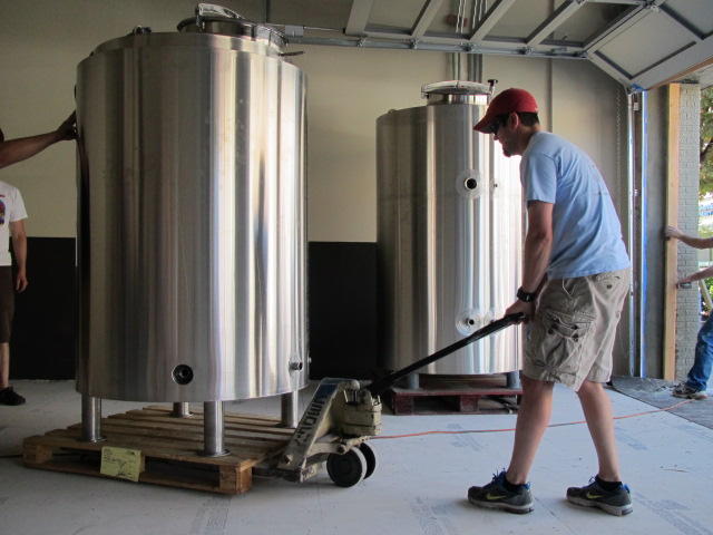 Mt Tabor founder/brewer Eric Surface positions new tank in Vancouver, WA brewhouse