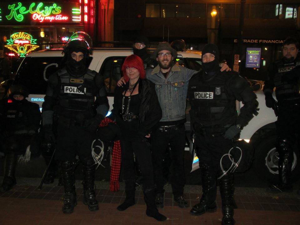 Ashley V Routson (with red hair) and Angelo De Ieso (to the right) with Portland's finest