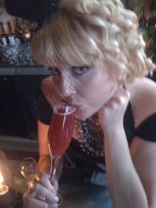 Ashley Routson sipping a beer cocktail