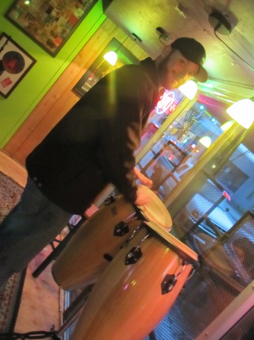 Elysian's Dave Chappell on the bongos at Plew's Brews