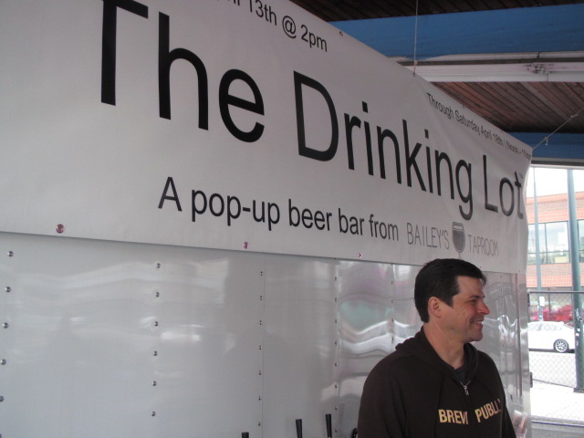 Bailey's Taproom founder Geoff Phillips enjoys a nice day at the Drinking Lot pop-up beer bar during 