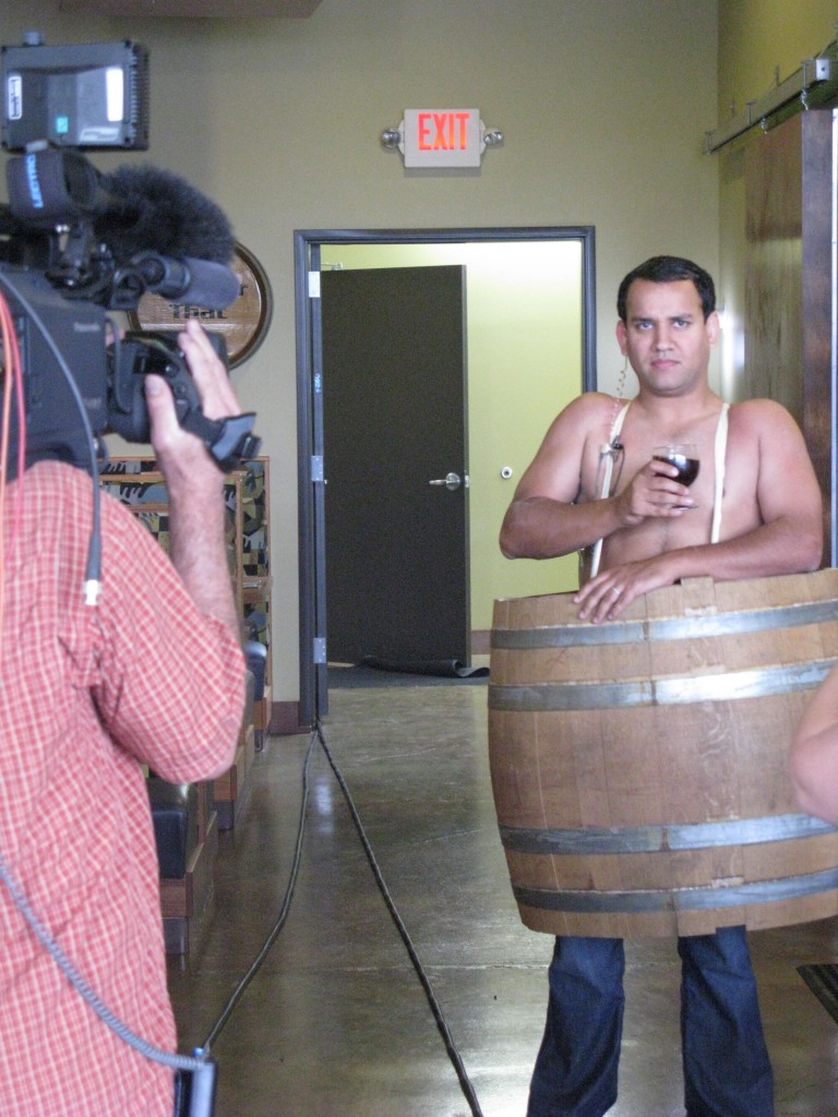 T.V. guys will go to any length to commit serious Journalism, from standing outside in hurricanes to this gent, who took off his shirt and strapped into a barrel for a story on the just-opened Cascade Barrel House several years ago. My mind is still boggling... (FoystonFoto)