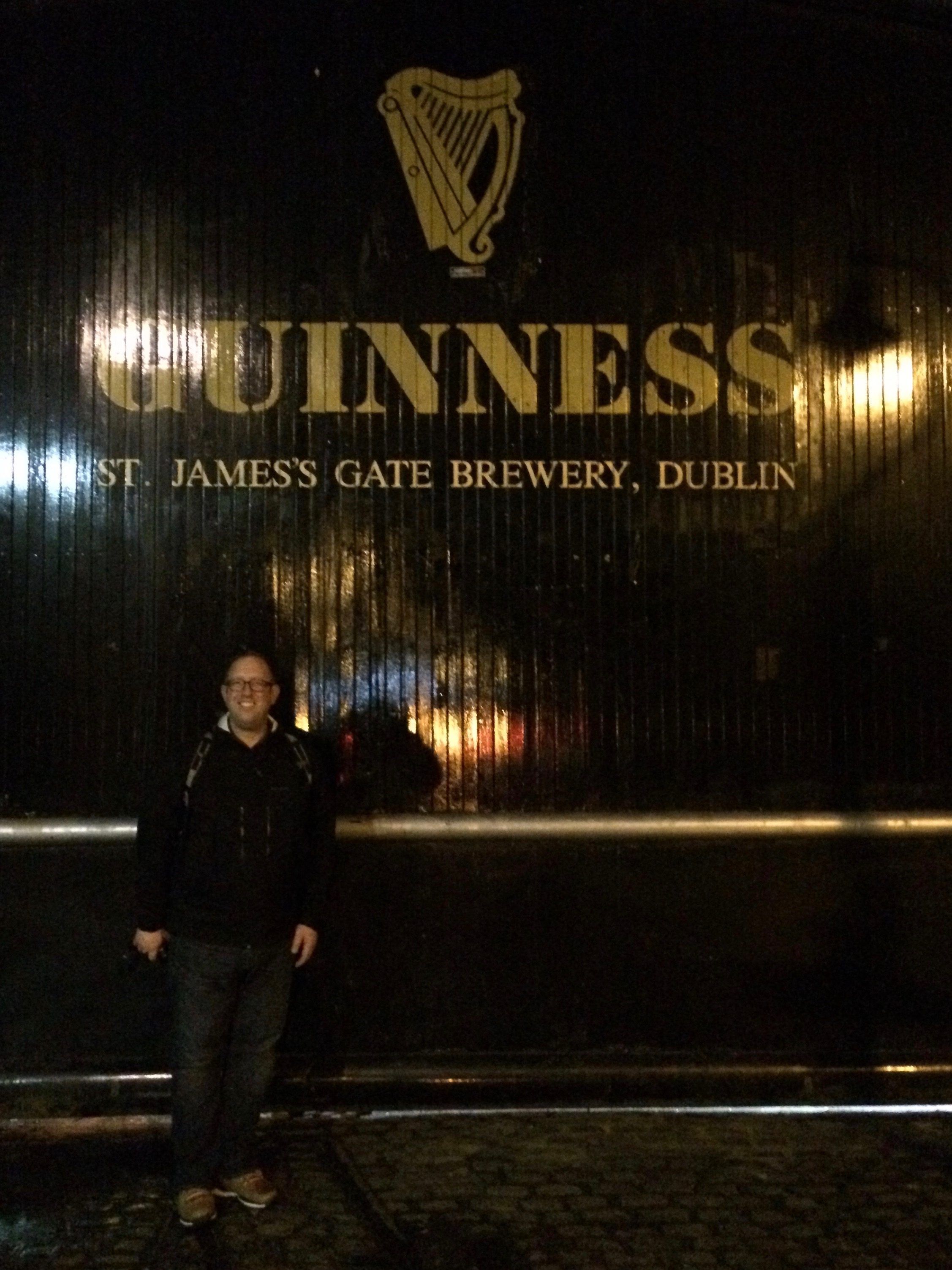 Standing outside in front of the famous Guinness Gates at St. James's Gate.