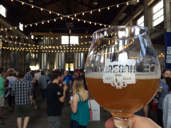 A glass pour at the 2015 Cheers to Belgian Beers.