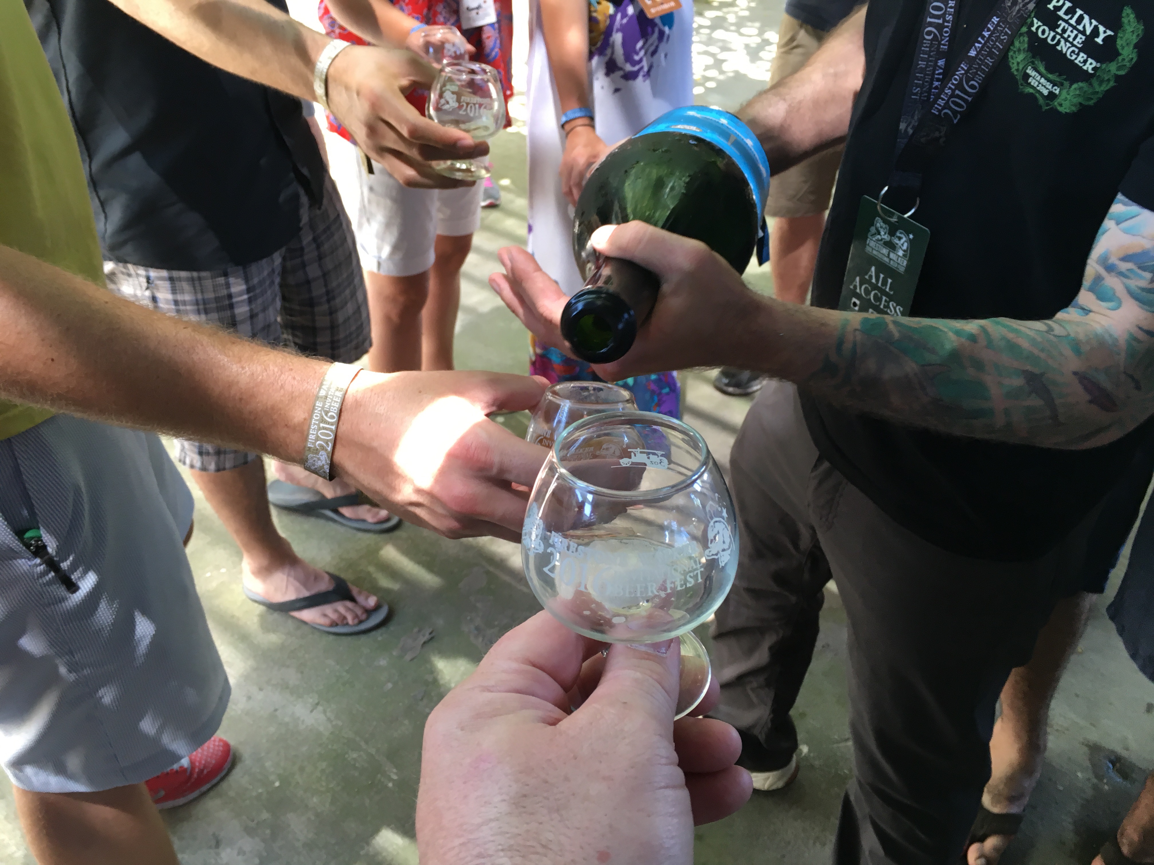 Receiving a pour of the 2009 Russian River Supplication during the 2016 Firestone Walker Invitational Beer Fest.