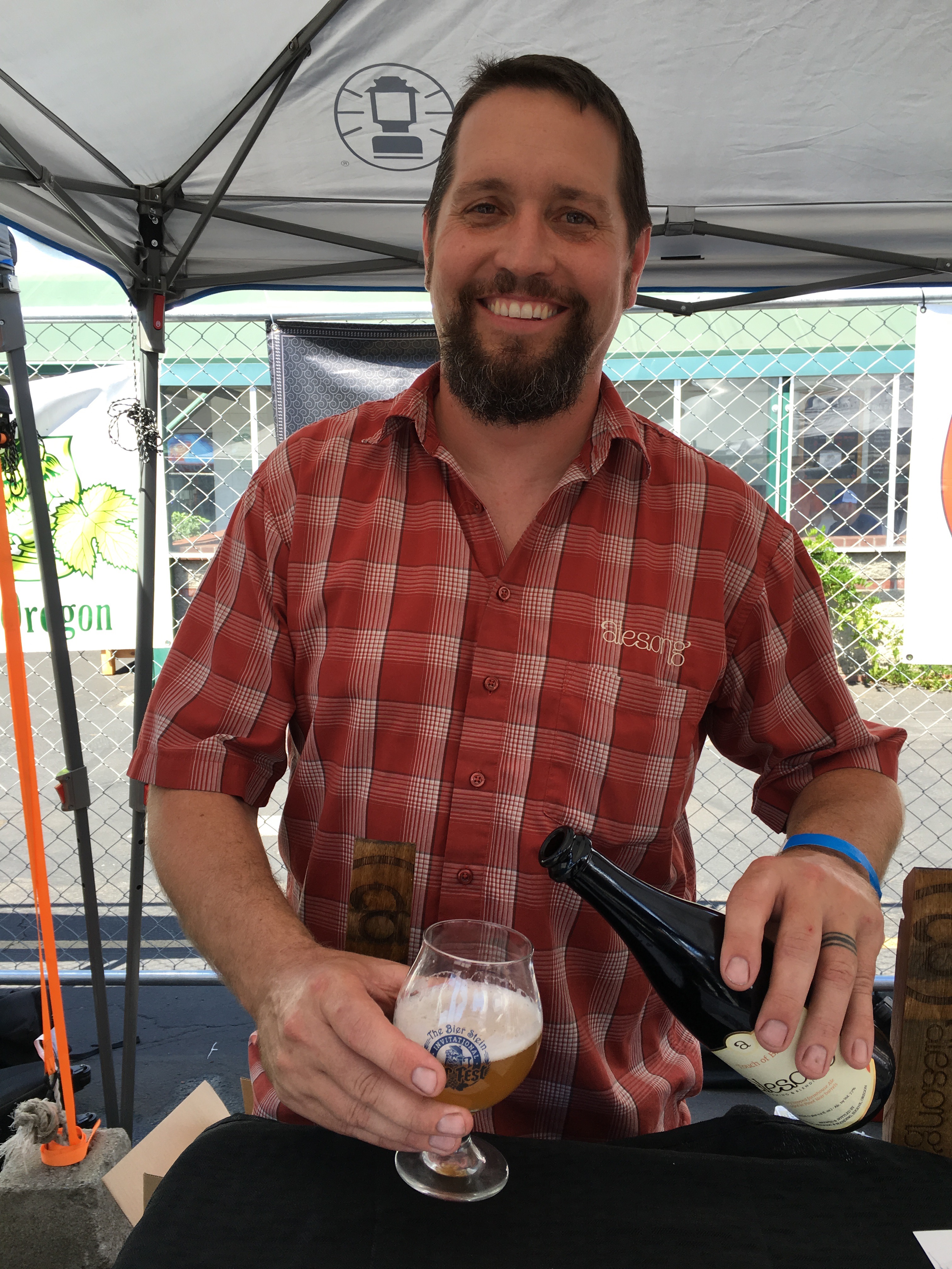 Matt Van Wyk of Alesong Brewing & Blending pouring Touch of Brett at The Bier Stein Invitational