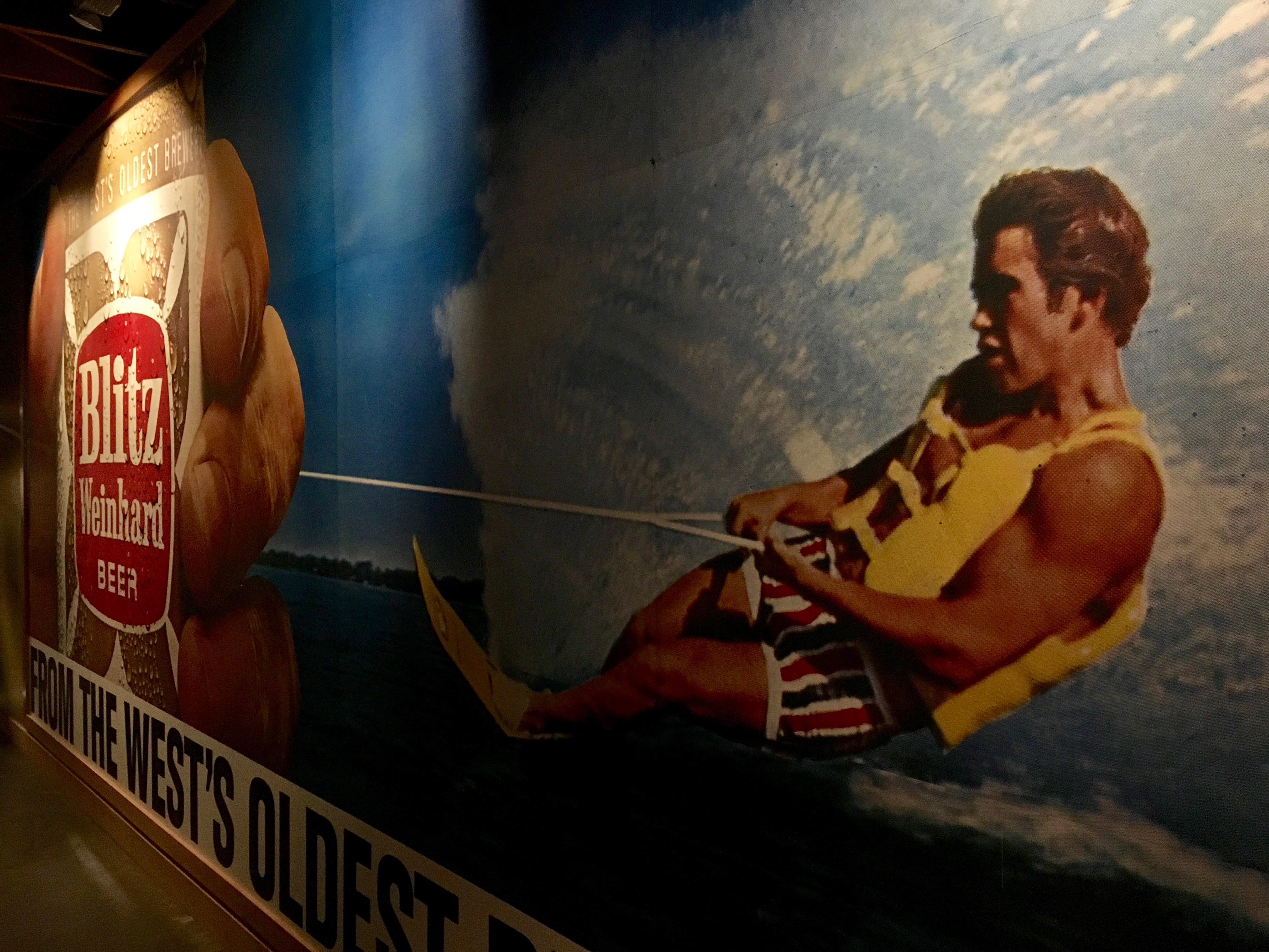 When you look closely at this vintage Blitz Weinhard mural, the water skier is a young Arnold Schwarzenegger.
