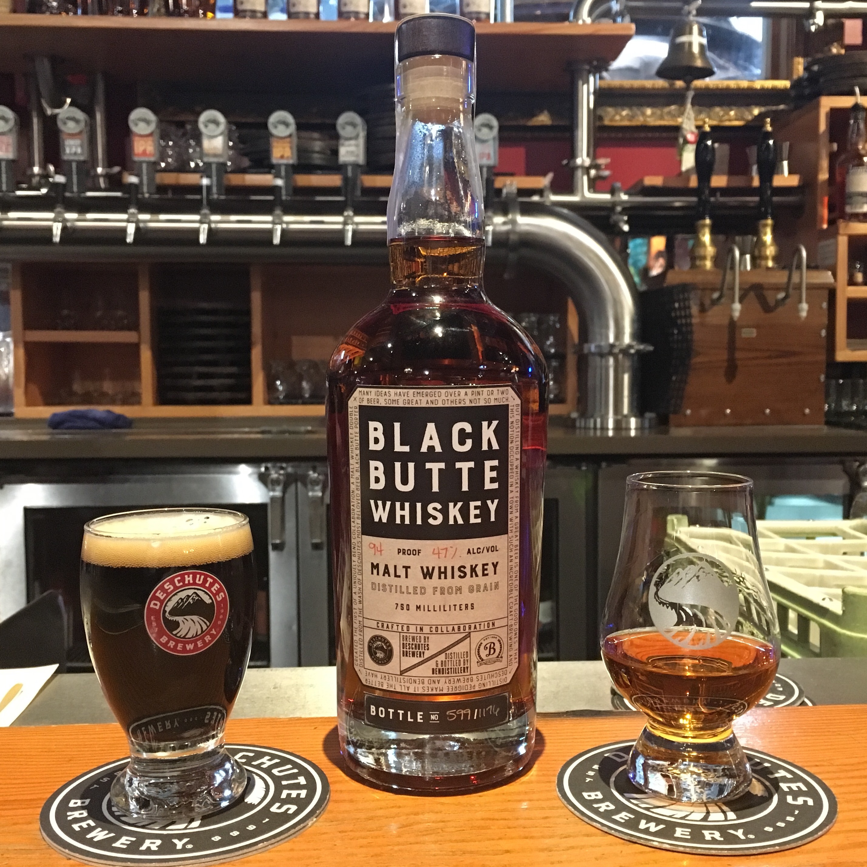 A neat pour of Bendistillery Black Butte Whiskey along with a Deschutes Black Butter Porter back at Deschutes Portland Public House.