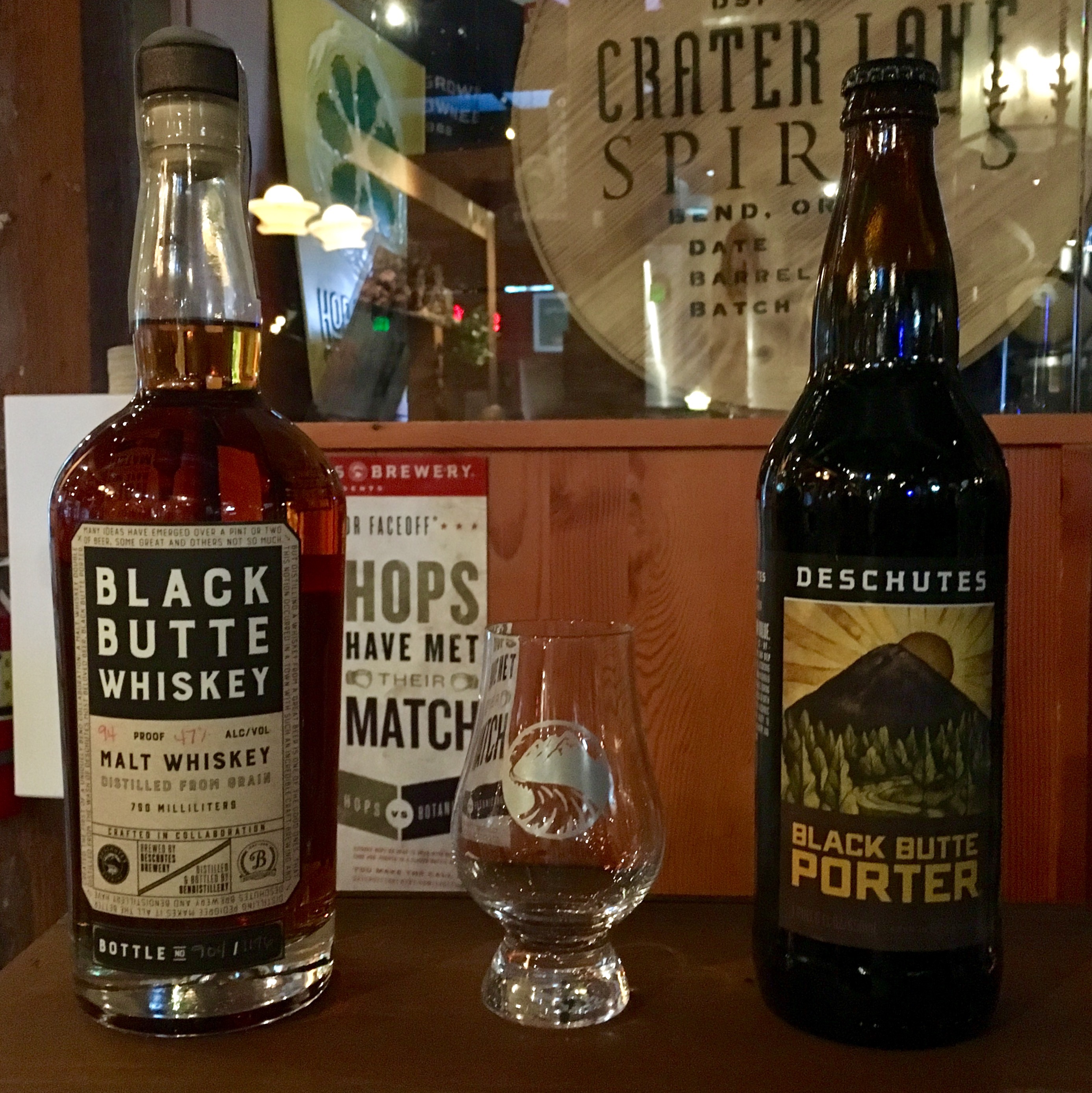 Bendistillery Black Butte Whiskey alongside Deschutes Black Butte Porter.