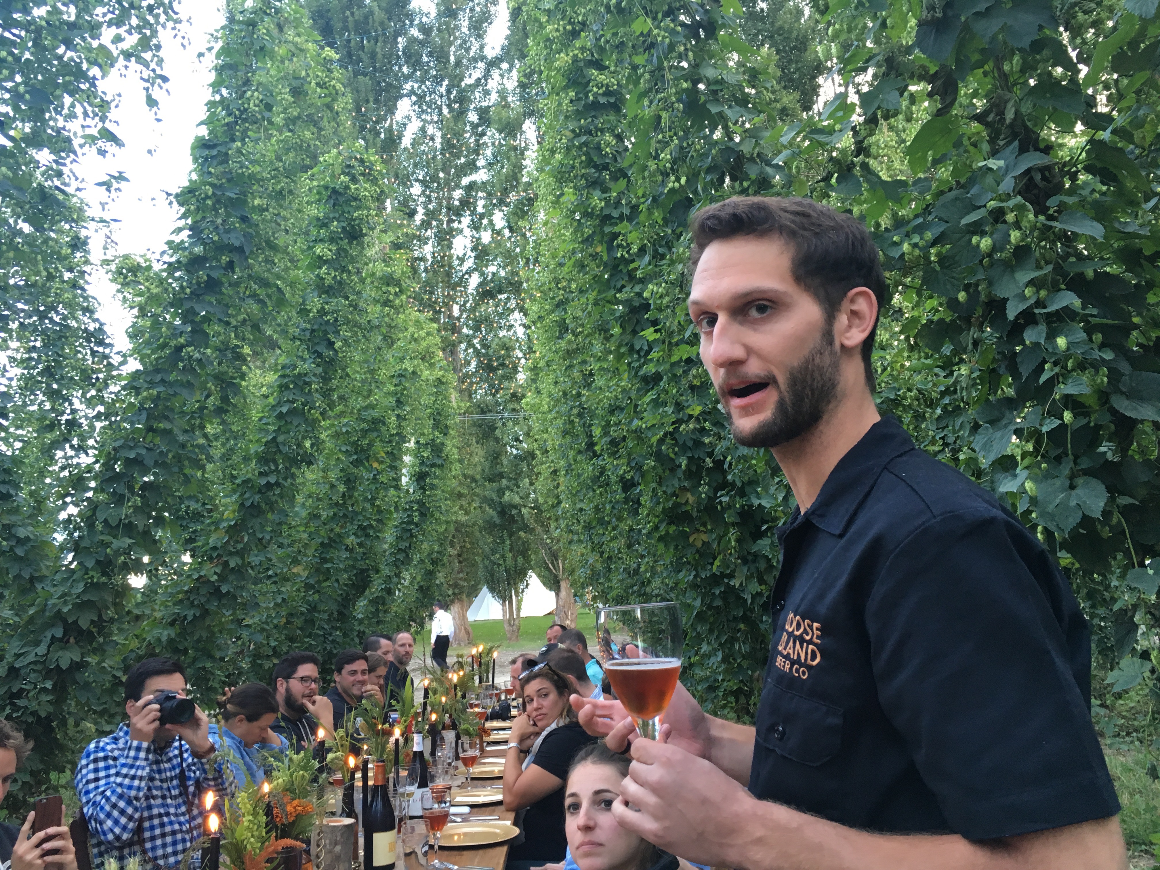 Goose Island brewer Quinn Fuechsl at the dinner in the Elk Mountain Farms hop field.