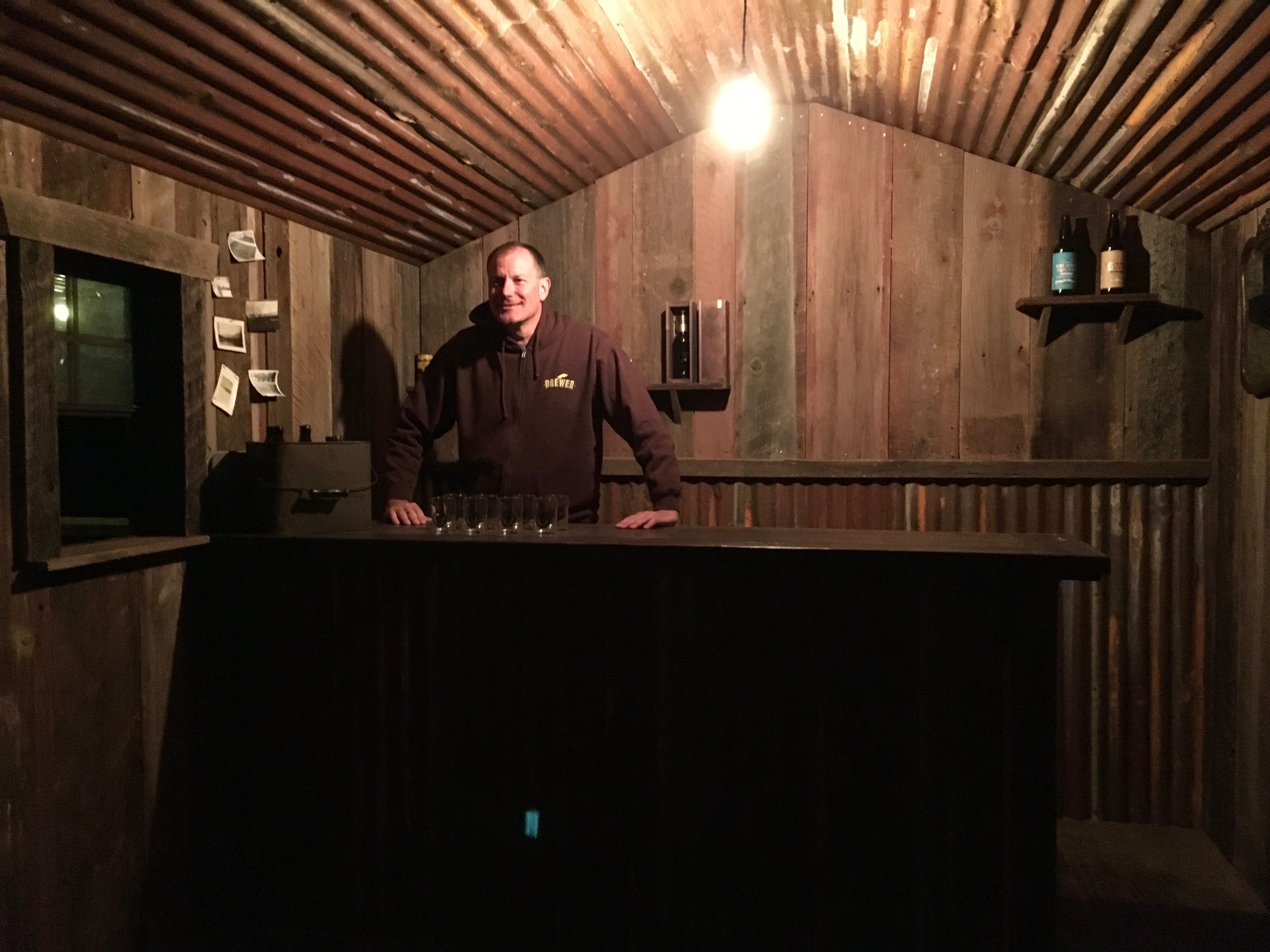 Goose Island's Mark Kamarauskas ready to serve Bourbon County Rare among other barrel aged treats at a remote pop-up bar at Elk Mountain Farms.