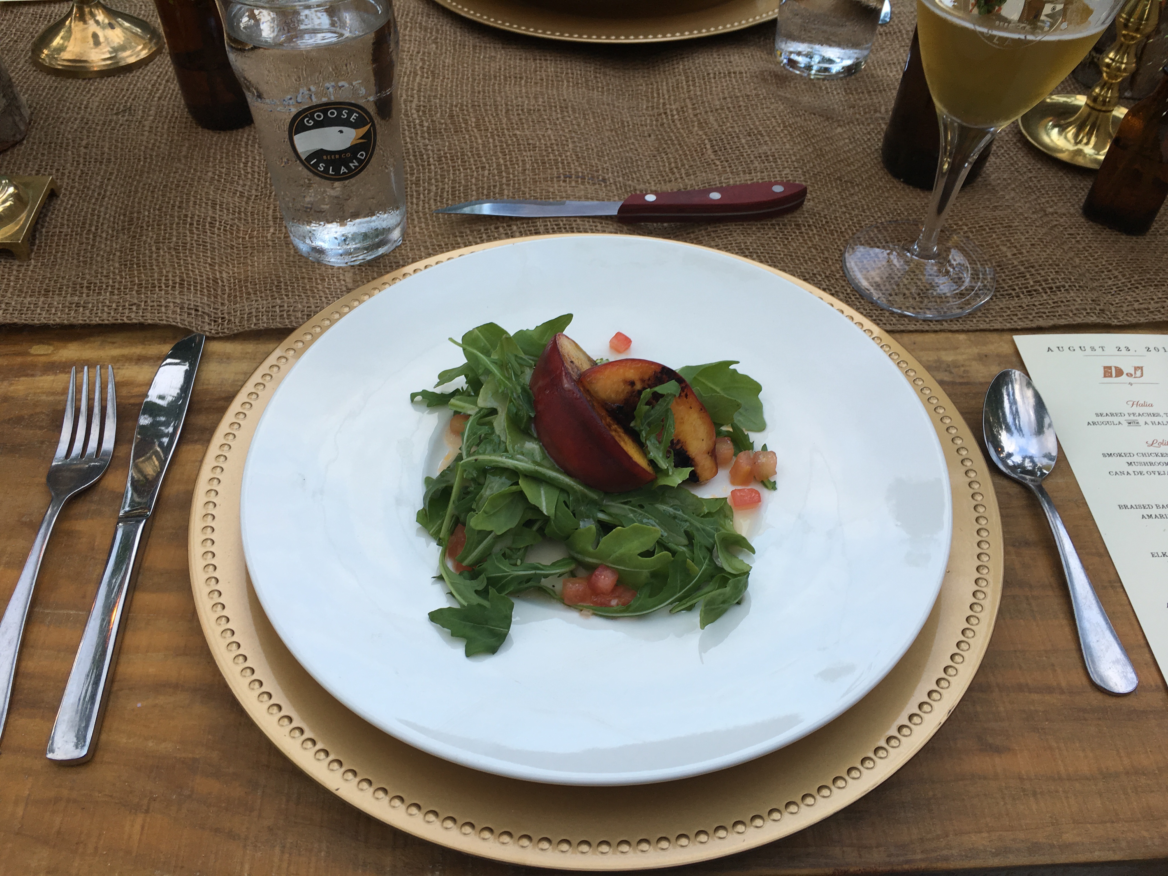 Hop field dinner first course of Seared Peaches, Tomato, Arugula with Halia Dressing at Elk Mountain Farms.