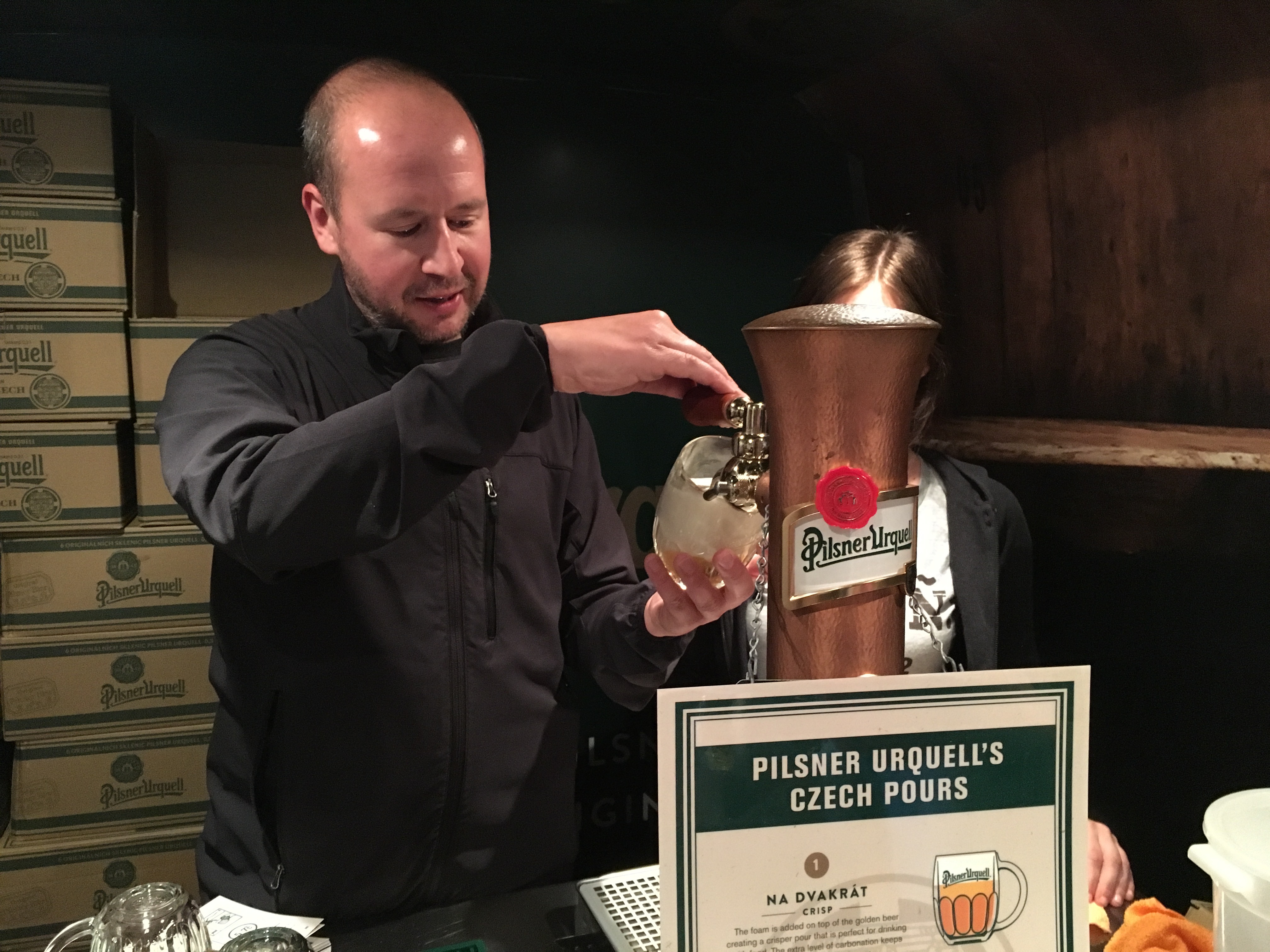 Matt Geary of Pilsner Urquell pouring a fresh Pilsner in his custom van outfitted with a tap.