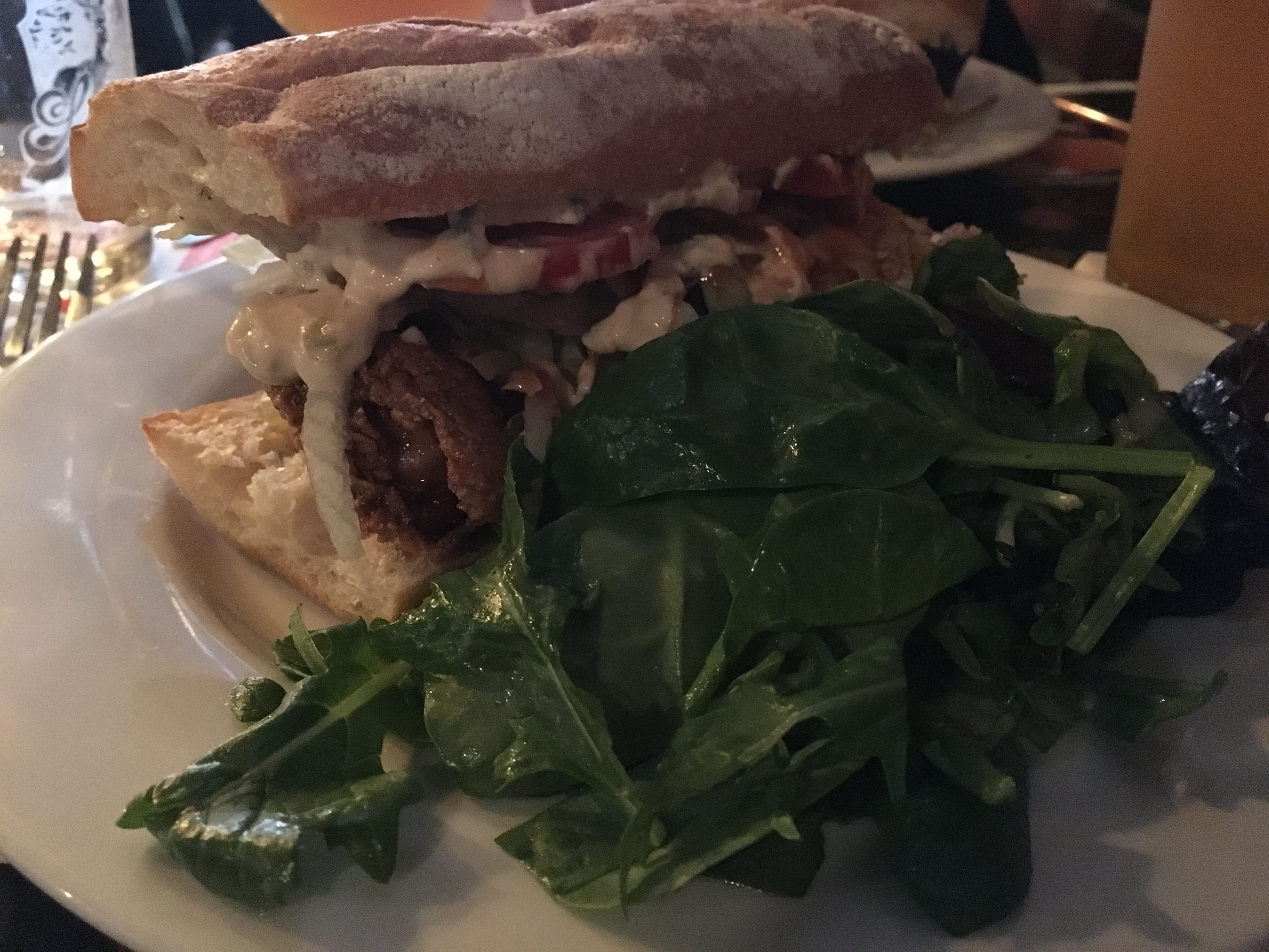Saraveza now offers a Fried Oyster Po Boy served with a side salad on its new menu.