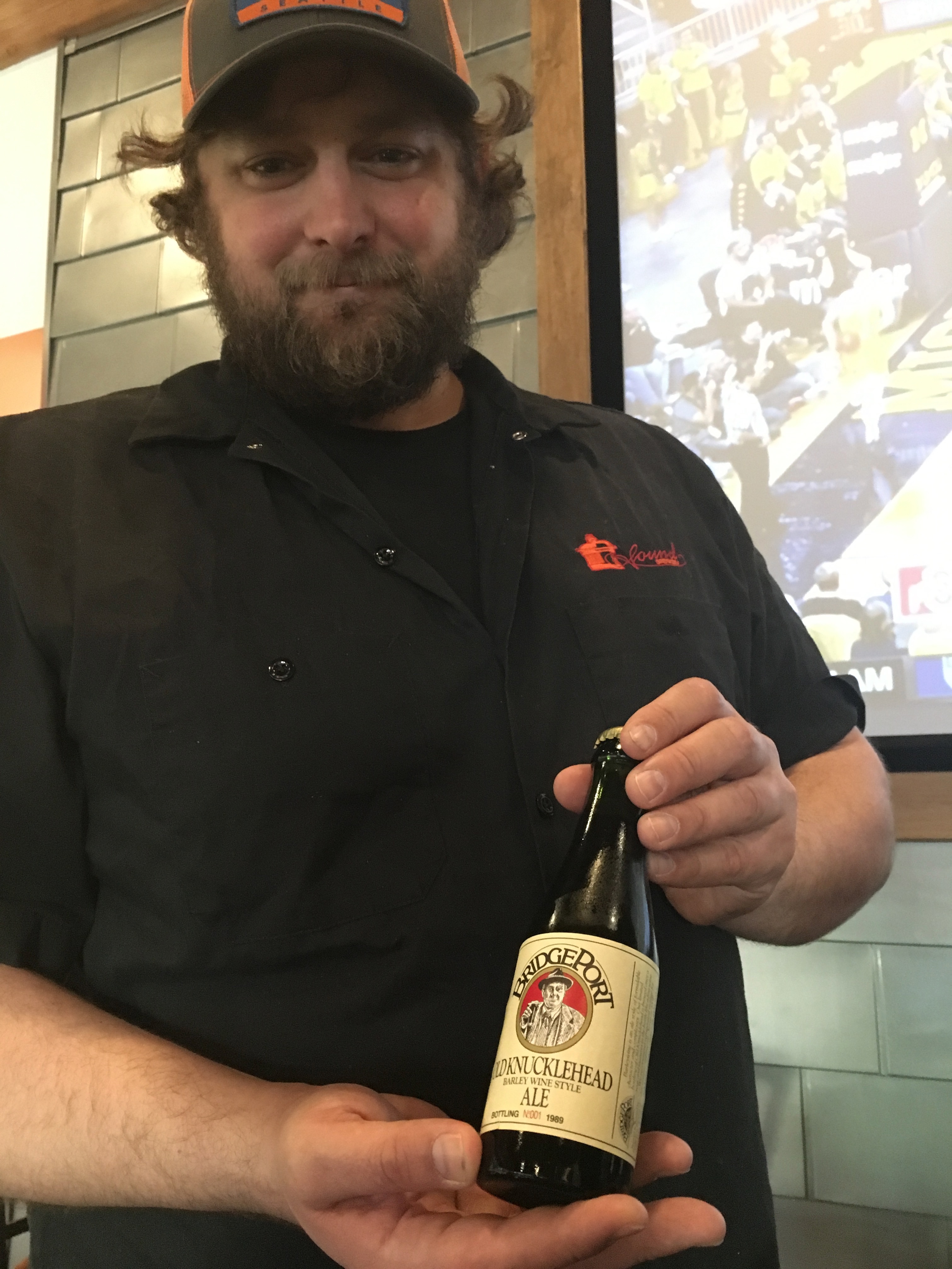 Tim Augustin from Ben's Bottle Shop gets ready to pour a bottle of BridgePort Brewing Old Knucklehead No. 001 that was bottled in 1989. Considering the age this beer held up quite well!
