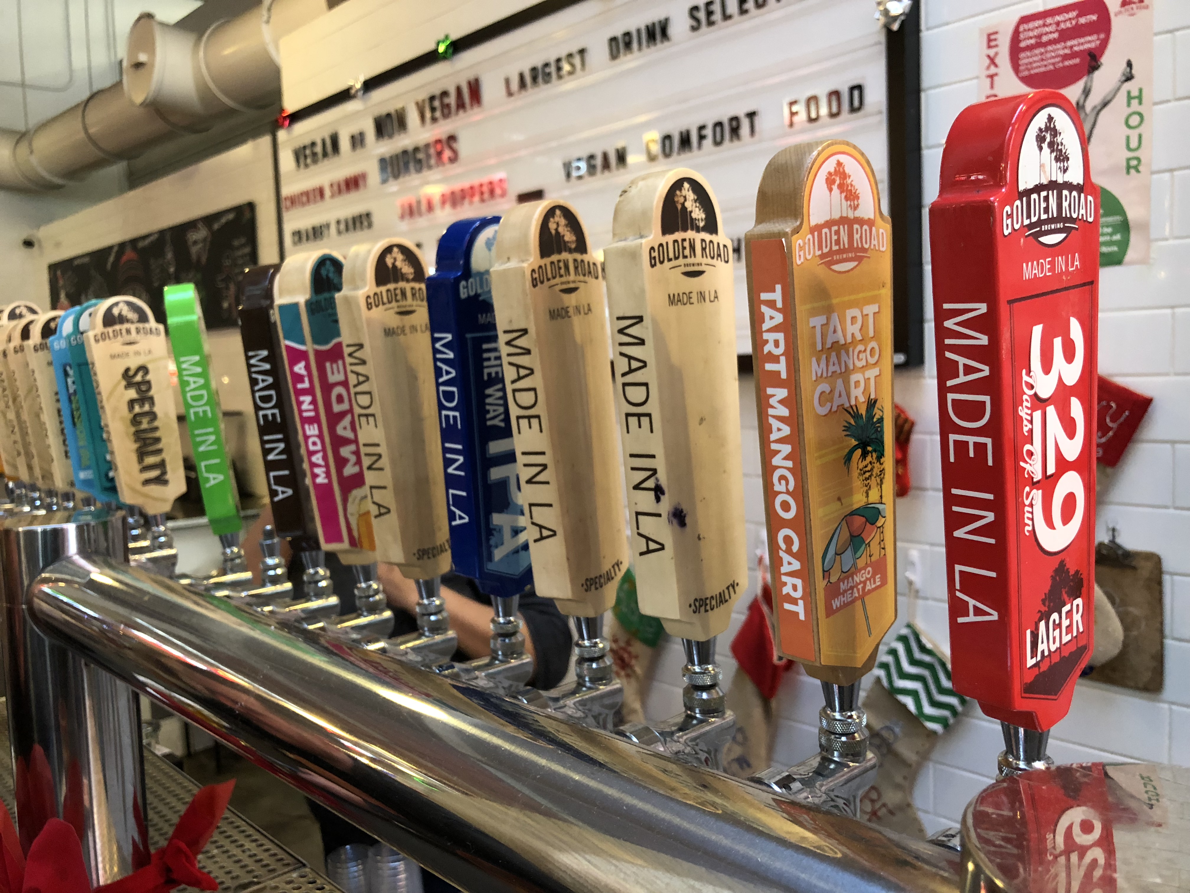Tap handles at Golden Road Brewing's tap room at Grand Central Market in Los Angeles.
