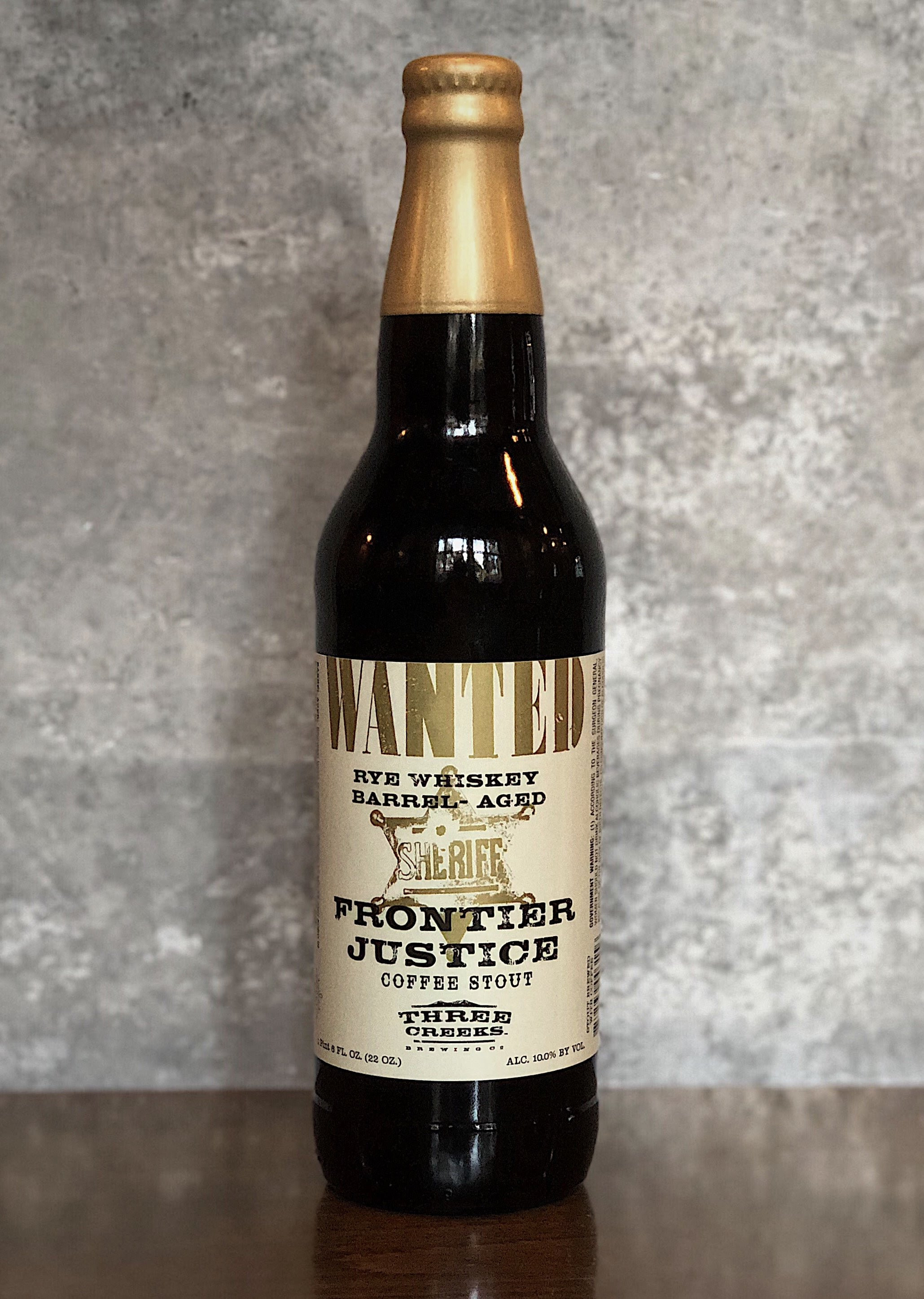 image of Rye Whiskey Barrel - Aged Frontier Justice Coffee Stout courtesy of Three Creeks Brewing