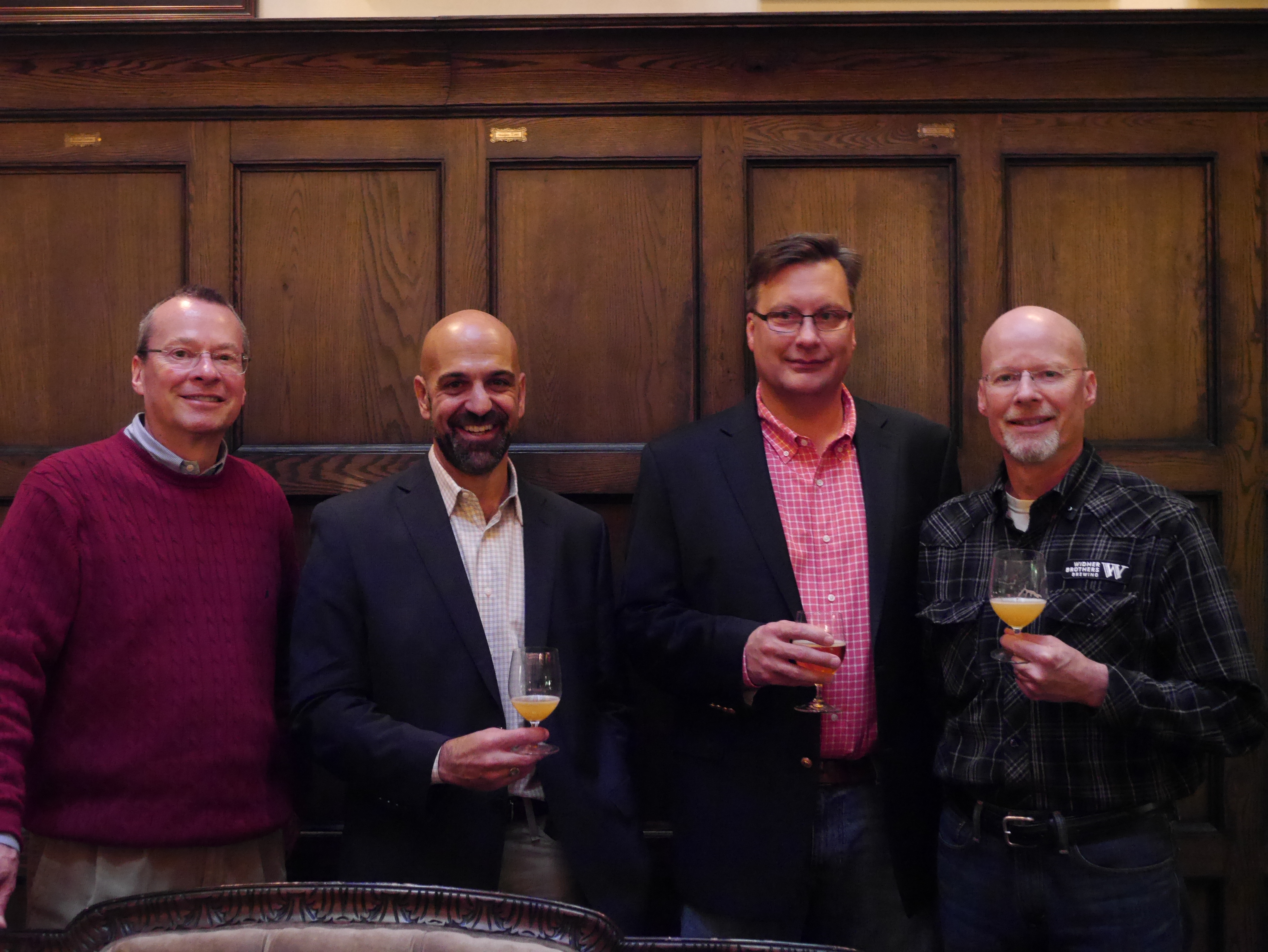 Kurt Widmer, Andy Thomas (CBA CEO), Scott Mennen (CBA COO) and Rob Widmer during the 2015 Craft Brewers Conference at the Multnomah Whiskey Library. (photo by Cat Stelzer)