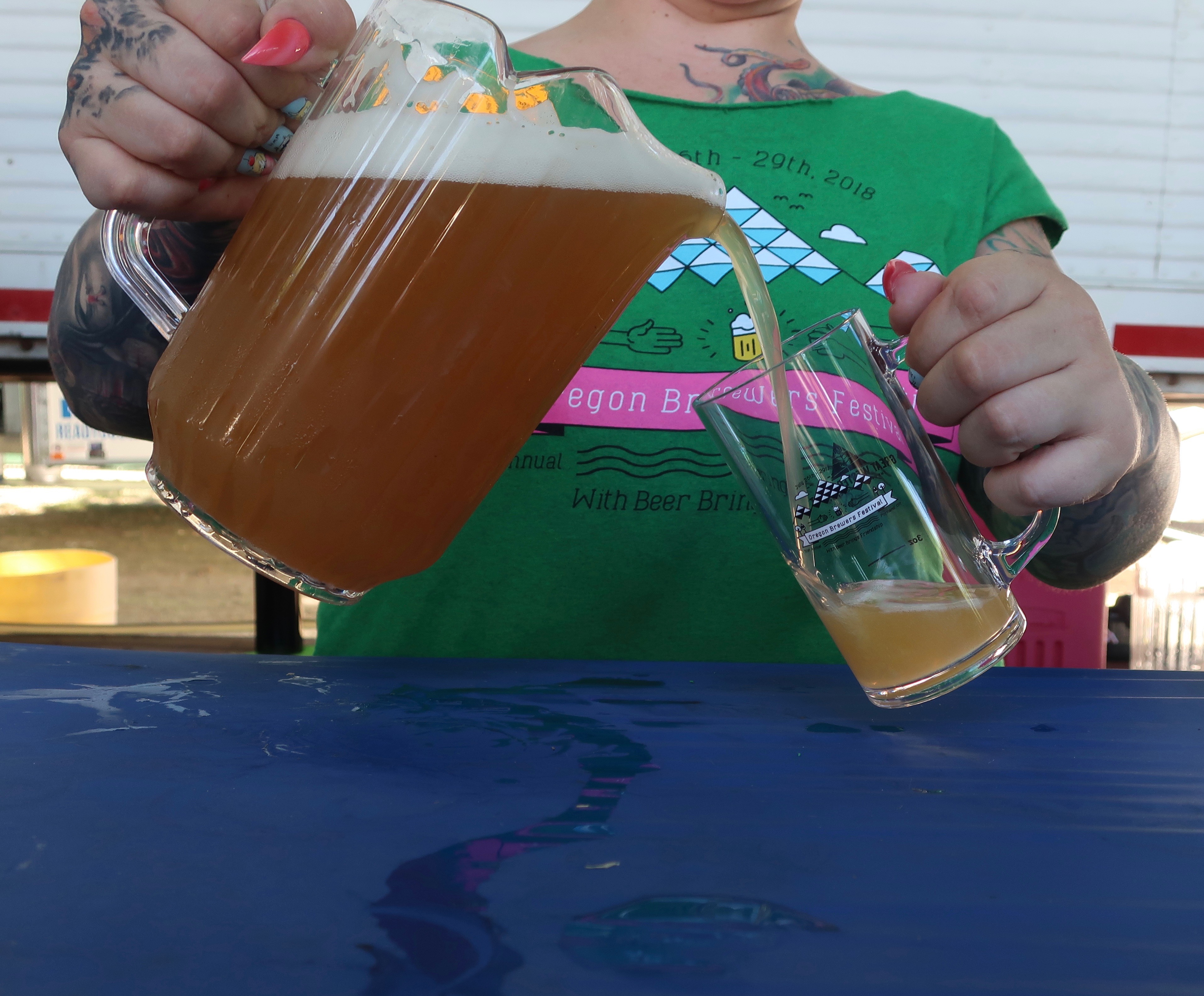 A beer being poured at the 2018 Oregon Brewers Festival
