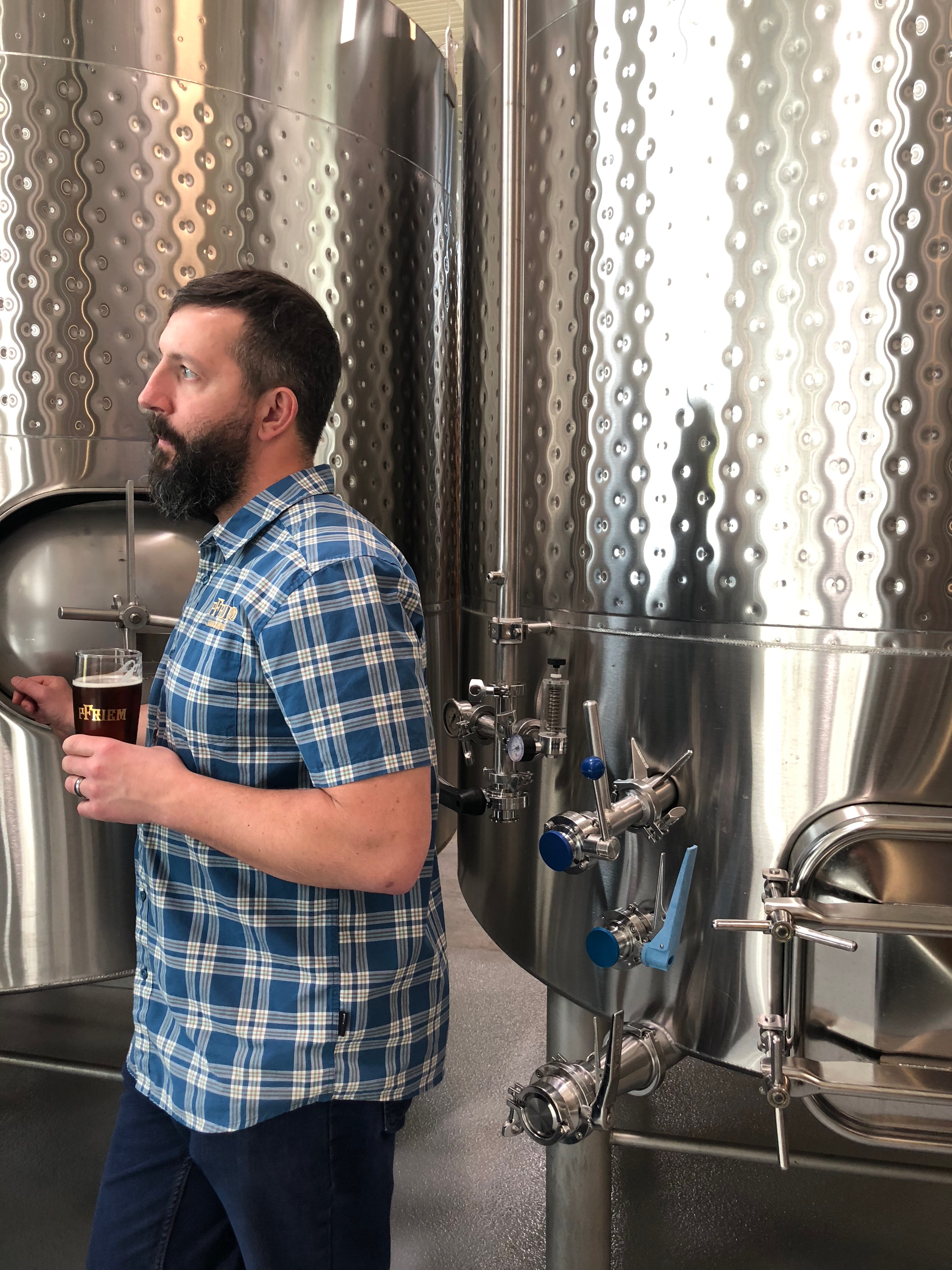 Josh Pfriem speaking during a brewery tour at pFriem Family Brewers.