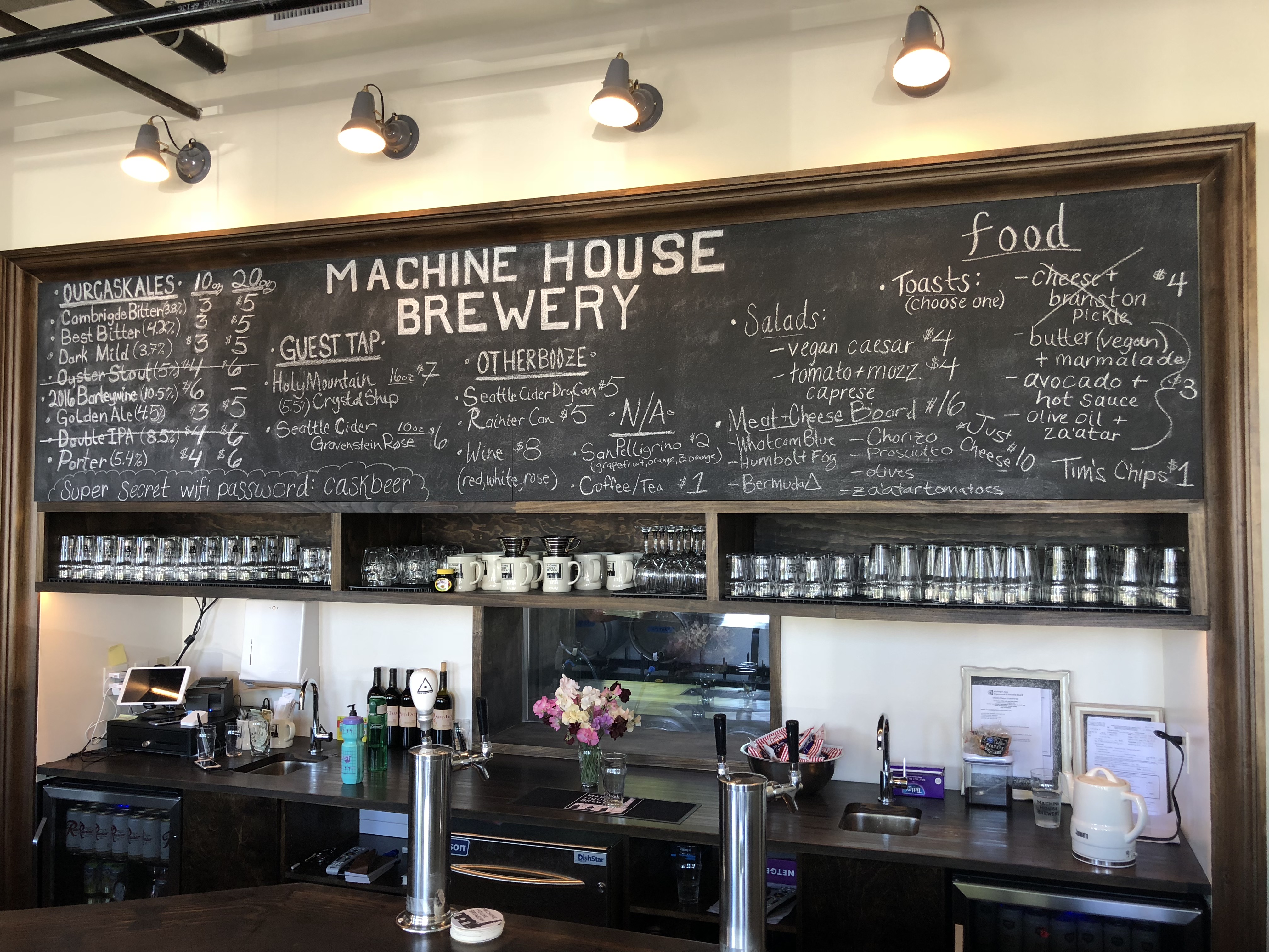 The menu board at Machine House Brewery Central District Taproom.