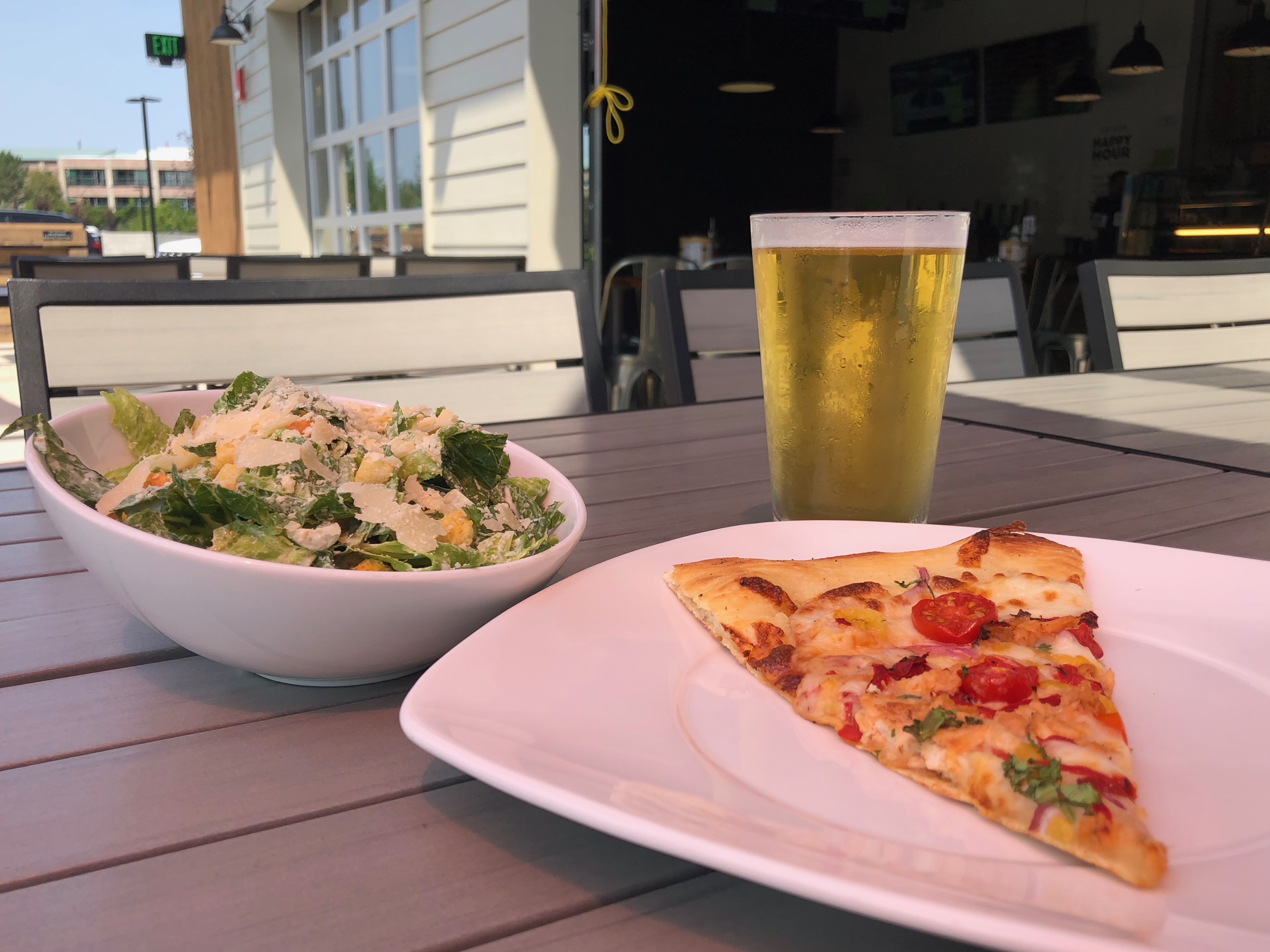 A great $9.95 deal of a slice of pizza, salad and beer at ZPizza Tap Room.