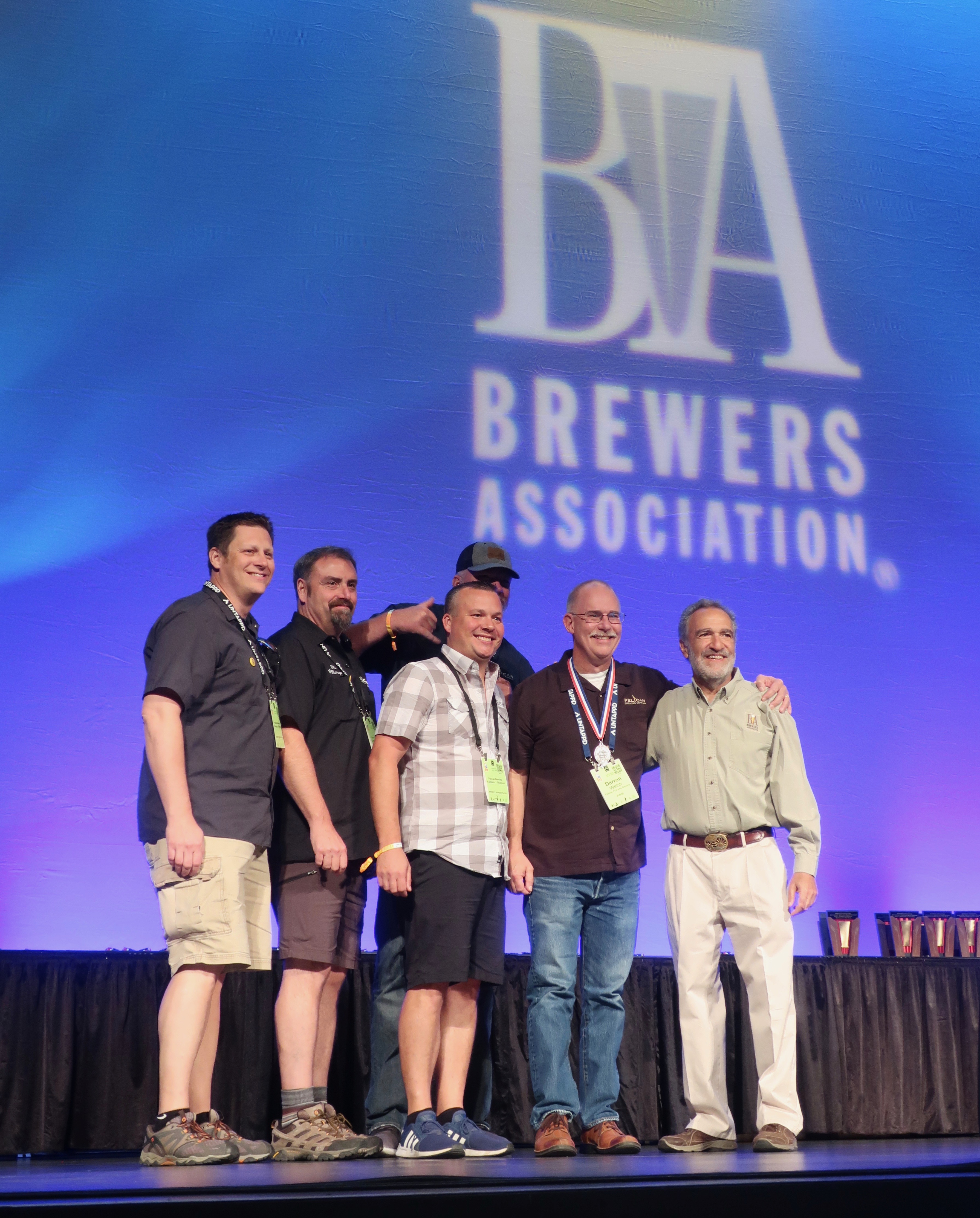 Pelican Brewing on stage accepting its medal at the 2018 Great American Beer Festival.