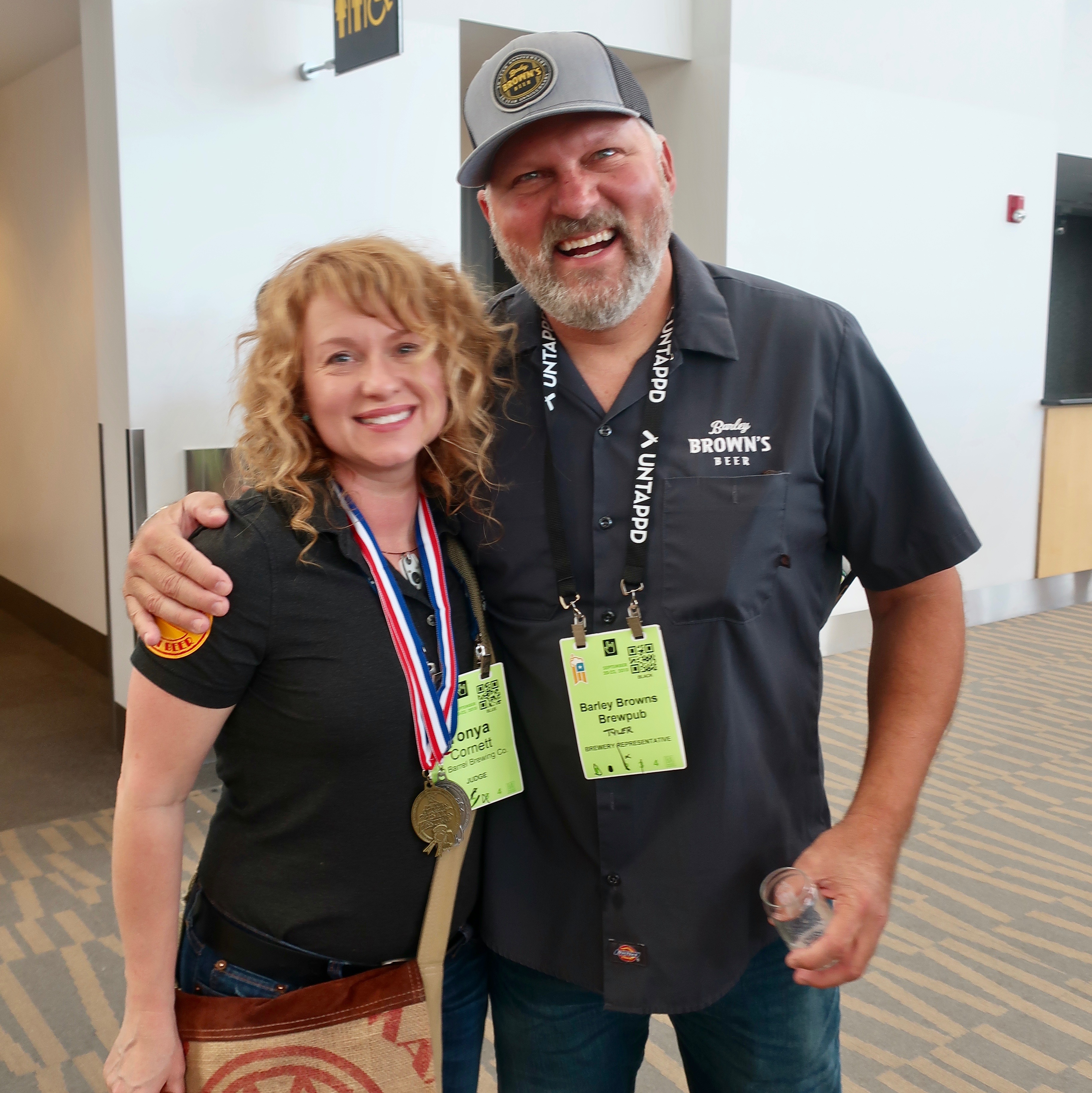 Tonya Cornett of 10 Barrel Brewing and Tyler Brown of Barley Brown's after the GABF Award Cermony at the 2018 Great American Beer Festival.