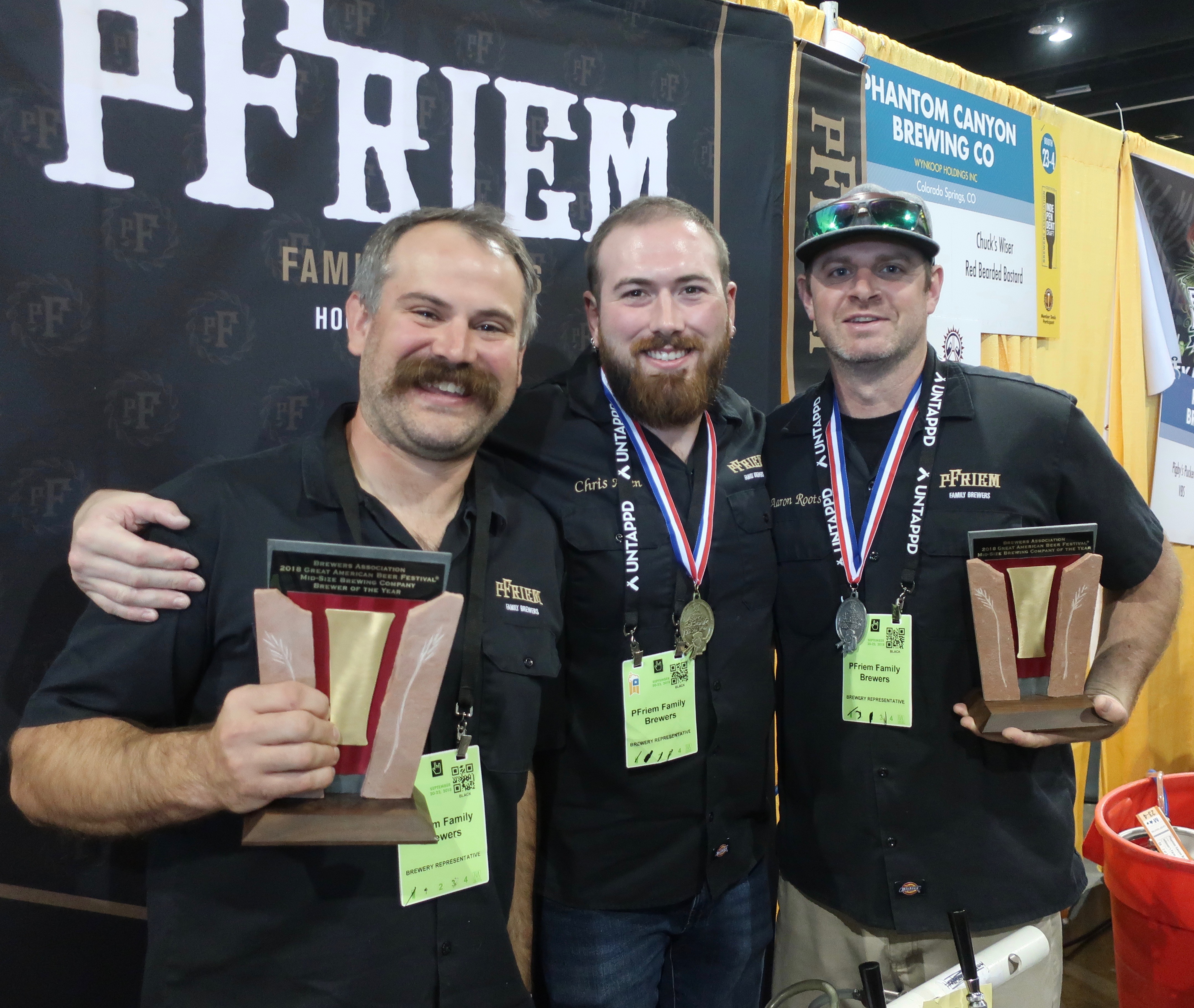 pFriem Family Brewers with their Mid Size Brewery of the Year Award and two GABF Medals at the 2018 Great American Beer Festival.