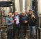Matthew Jarrell, Director of Culinary Operations at Paley Hospitality, Garrett Peck, Director of Operations at Paley Hospitality and Erick Russ and Larry Clouser, Co-Owners of Pono Brewing during brew day for Bushel & A Peck IPA.