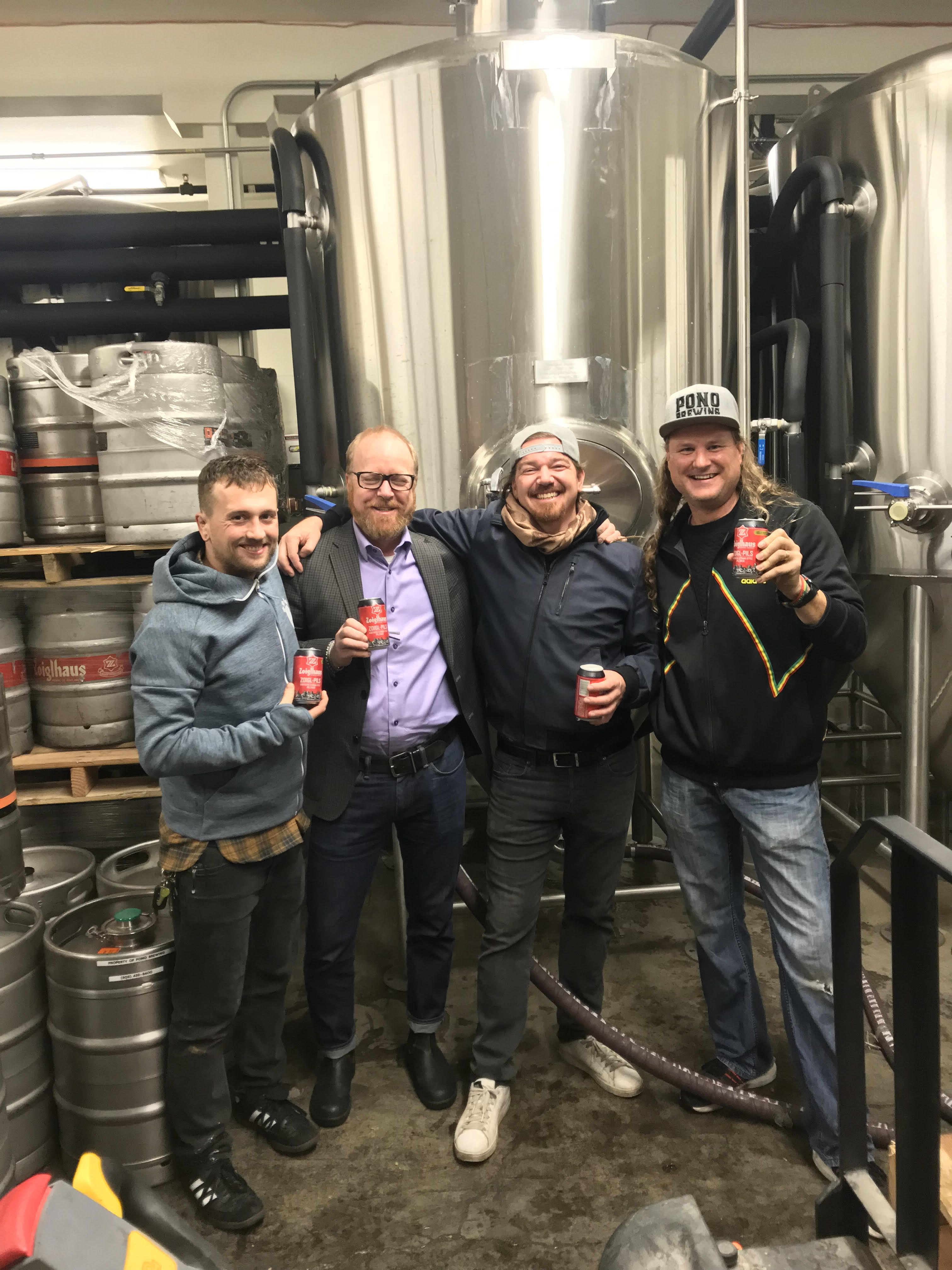 Matthew Jarrell, Director of Culinary Operations at Paley Hospitality, Garrett Peck, Director of Operations at Paley Hospitality and Erick Russ and Larry Clouser, Co-Owners of Pono Brewing during brew day for Bushel & A Peck IPA.