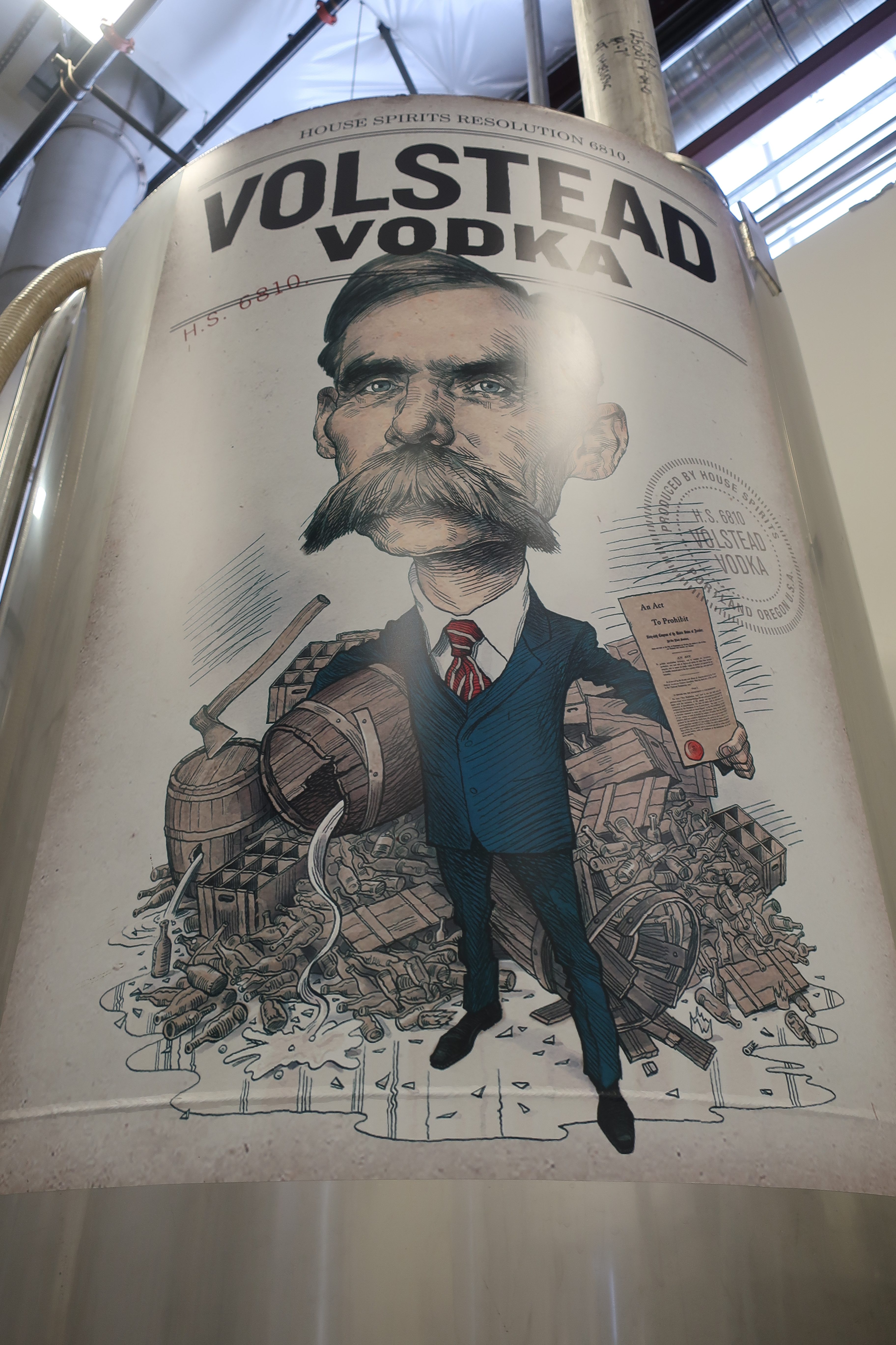 A tank inside House Spirits with the Volstead Vodka label on it.