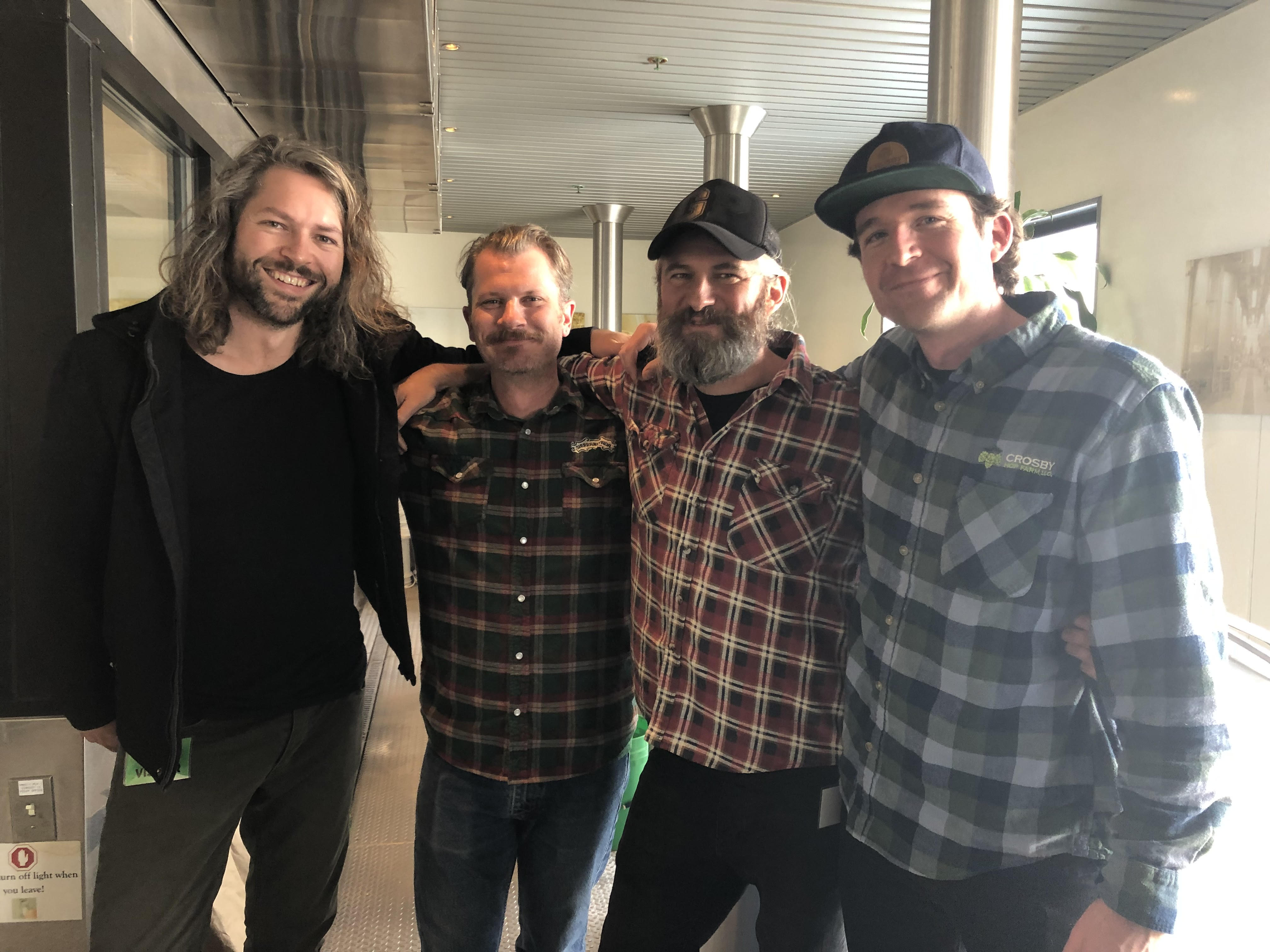 From left, Jos Ruffell - Garage Project, Isaiah Mangold - Sierra Nevada Brewer, Pete Gillespie - Garage Project, and Zak Schroerlucke - Crosby Hop Farm collaborating on a beer for the 2019 Craft Brewers Conference. (image courtesy of Crosby Hop Farm)