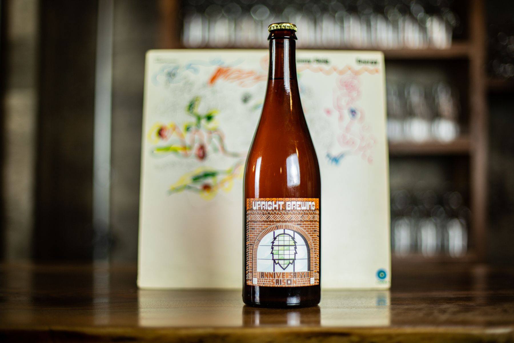 image of Upright Brewing's 10th Anniversary Saison in a 750mL bottle courtesy of Upright Brewing
