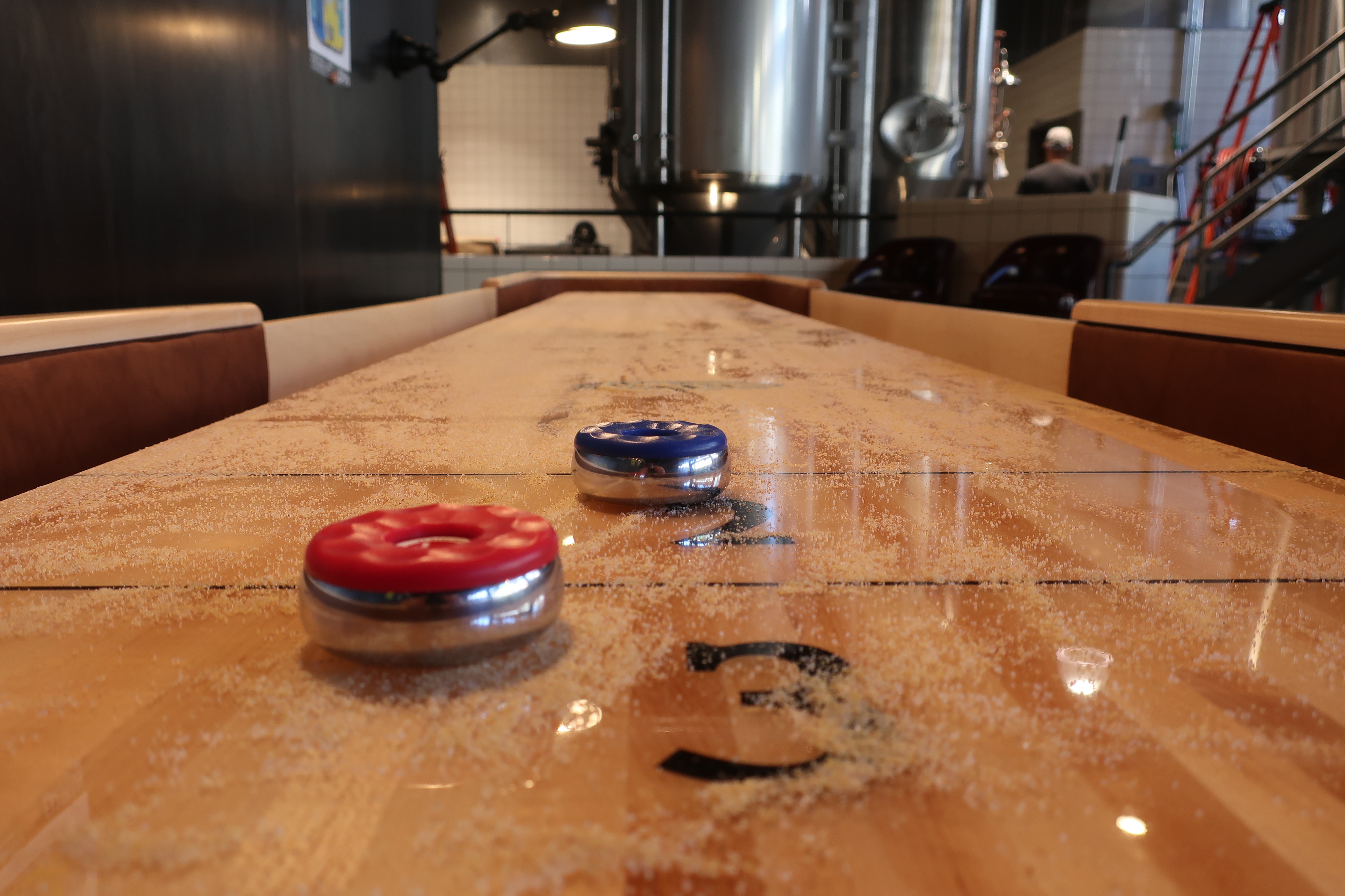 Shuffleboard is now an option at the remodeled Elysian Brewing - Capitol Hill.