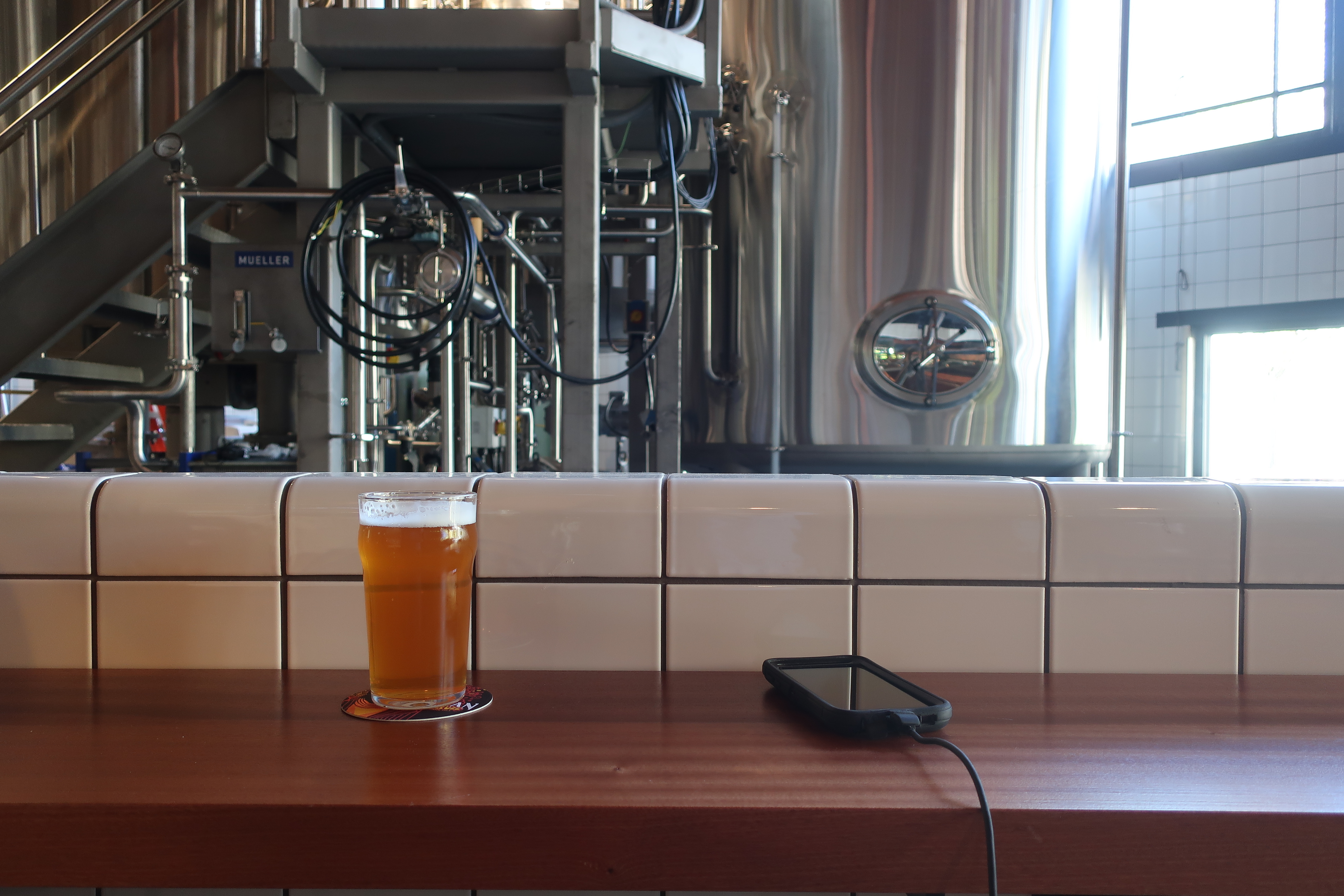 The "Brewers Alley" bar overlooks the brewhouse at Elysian Brewing - Capitol Hill.