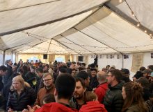 The festive crowd fills the tent at the NW Coffee Beer Invitational.