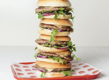 image of a stack of Hopyard Cheddar Burger courtesy of Burgerville
