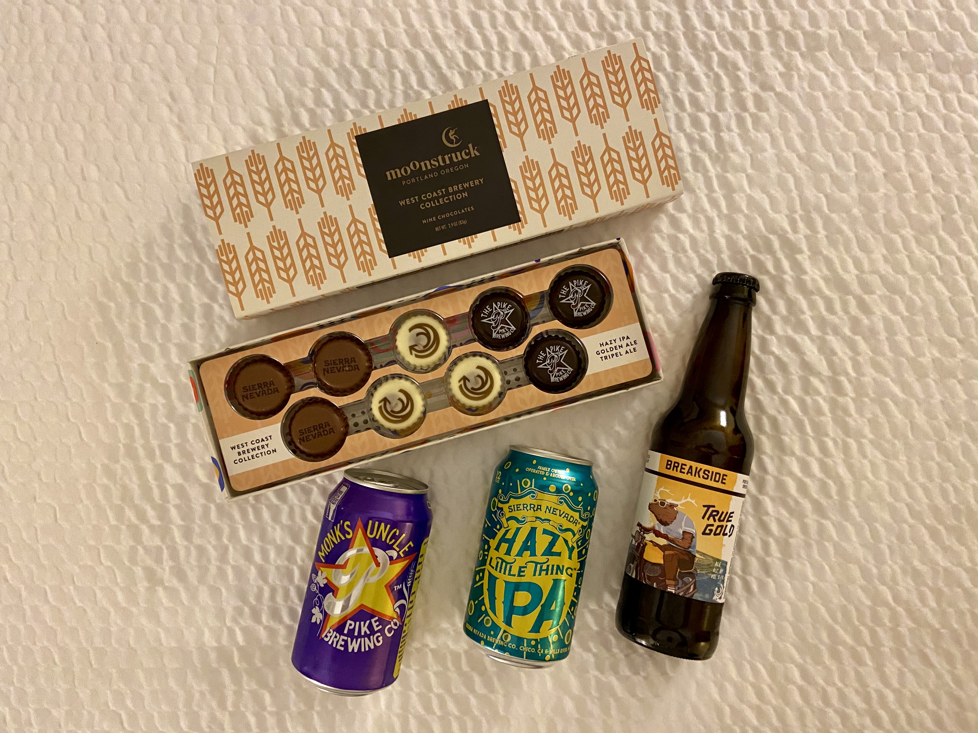 Moonstruck Chocolate West Coast Brewery Collection with Breakside Brewery’s True Gold Golden Ale, Pike Brewing’s Monk’s Uncle Tripel Ale and Sierra Nevada’s Hazy Little Thing IPA.