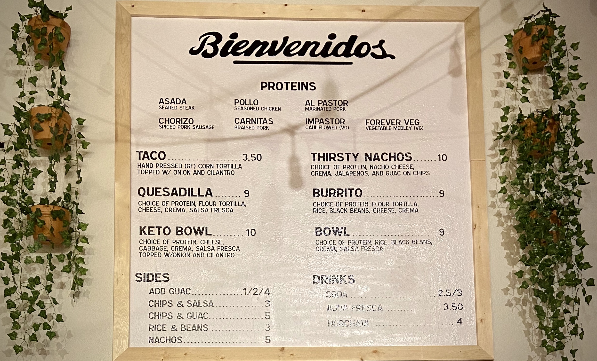 The opening day menu board at Tight Tacos that's located inside Thirsty Monk.