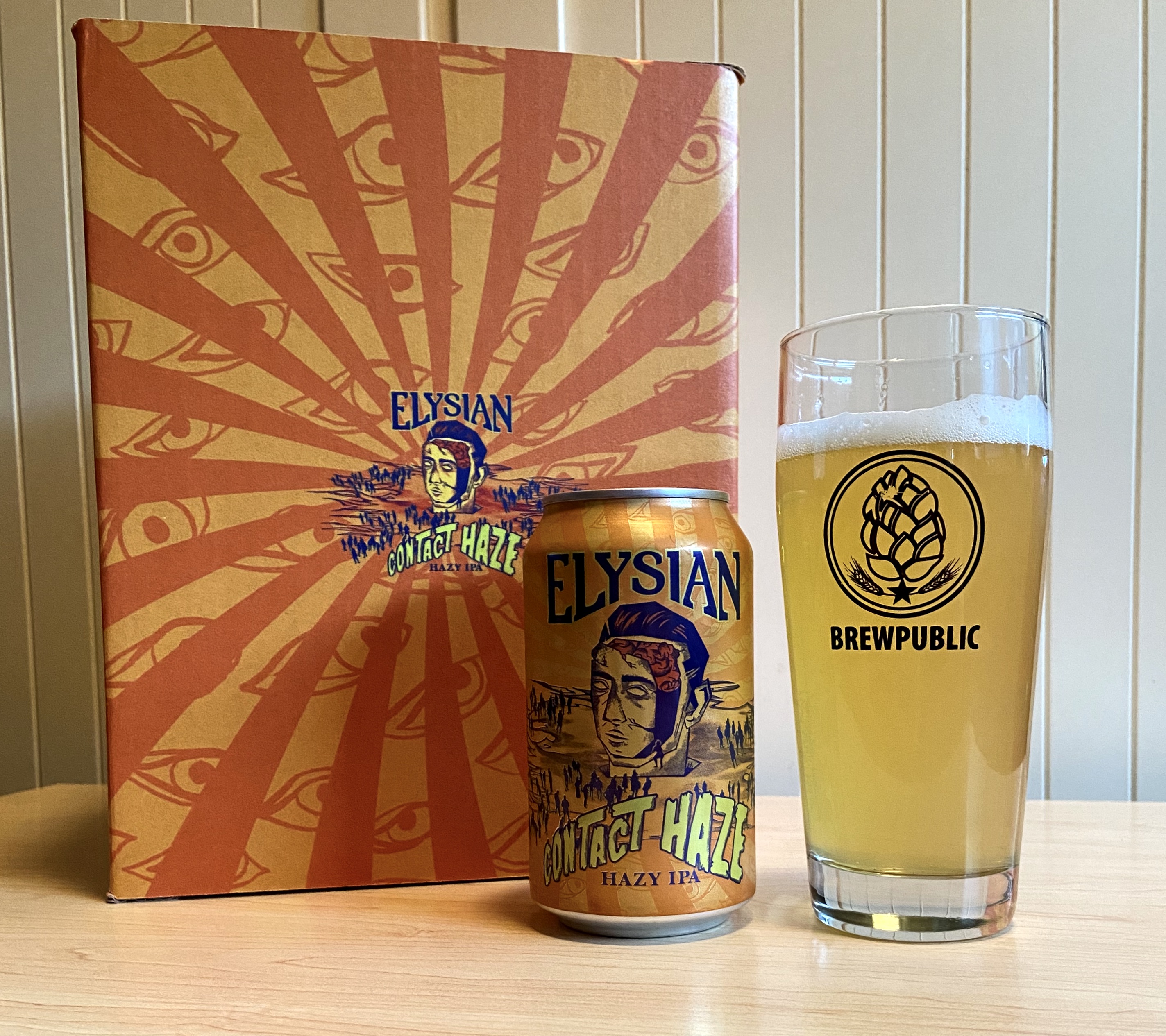 Elysian Brewing Contact Haze Hazy IPA served in a BREWPUBLIC glass.