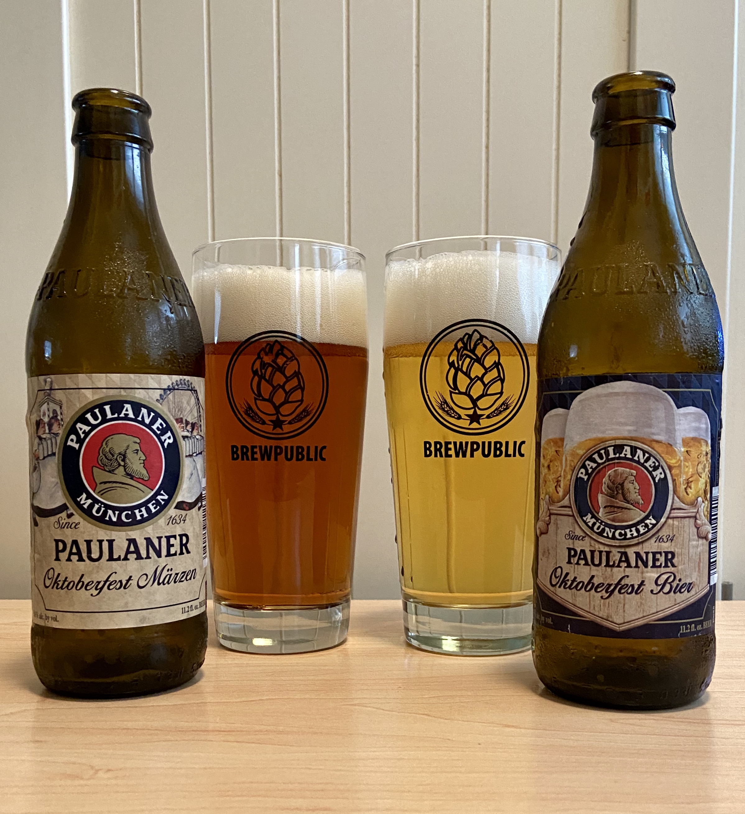 Glass pours of Paulaner Oktoberfest Marzen and Paulaner Oktoberfest Bier