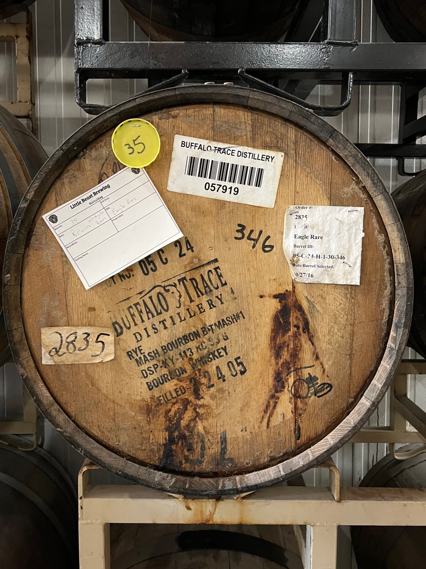 Beer resting in a barrel formerly used by Eagle Rare of Buffalo Trace Distillery at Little Beast Brewing.