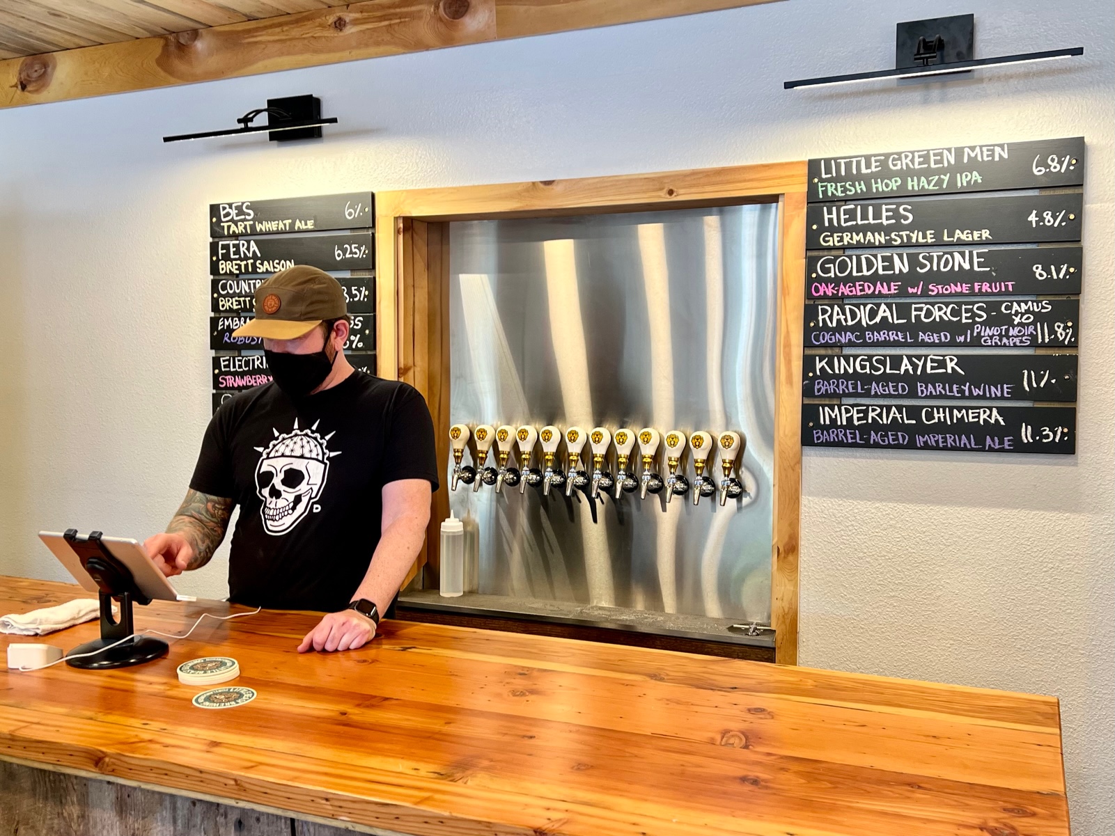 Ryan Jones, Little Beast Tasting Room and Bottle Club Manager, served beers during our visit.