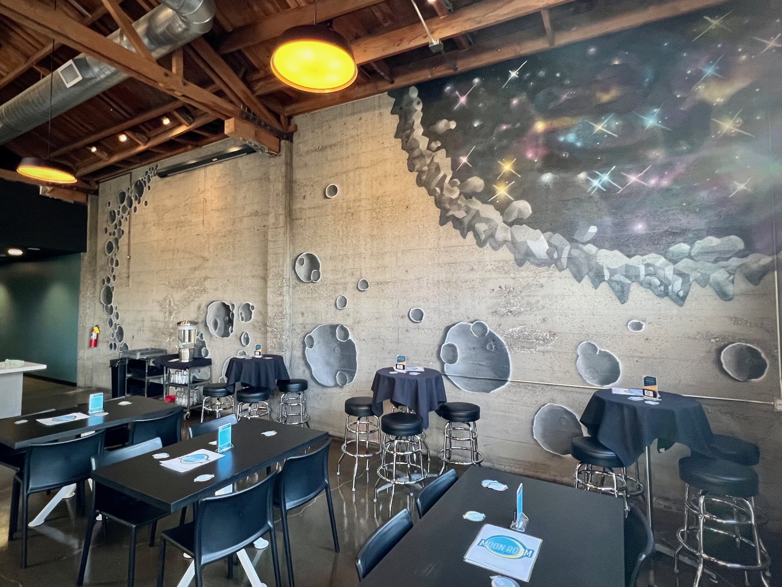 The interior walls have added moonscape scenes at Ecliptic Brewing's Moon Room.